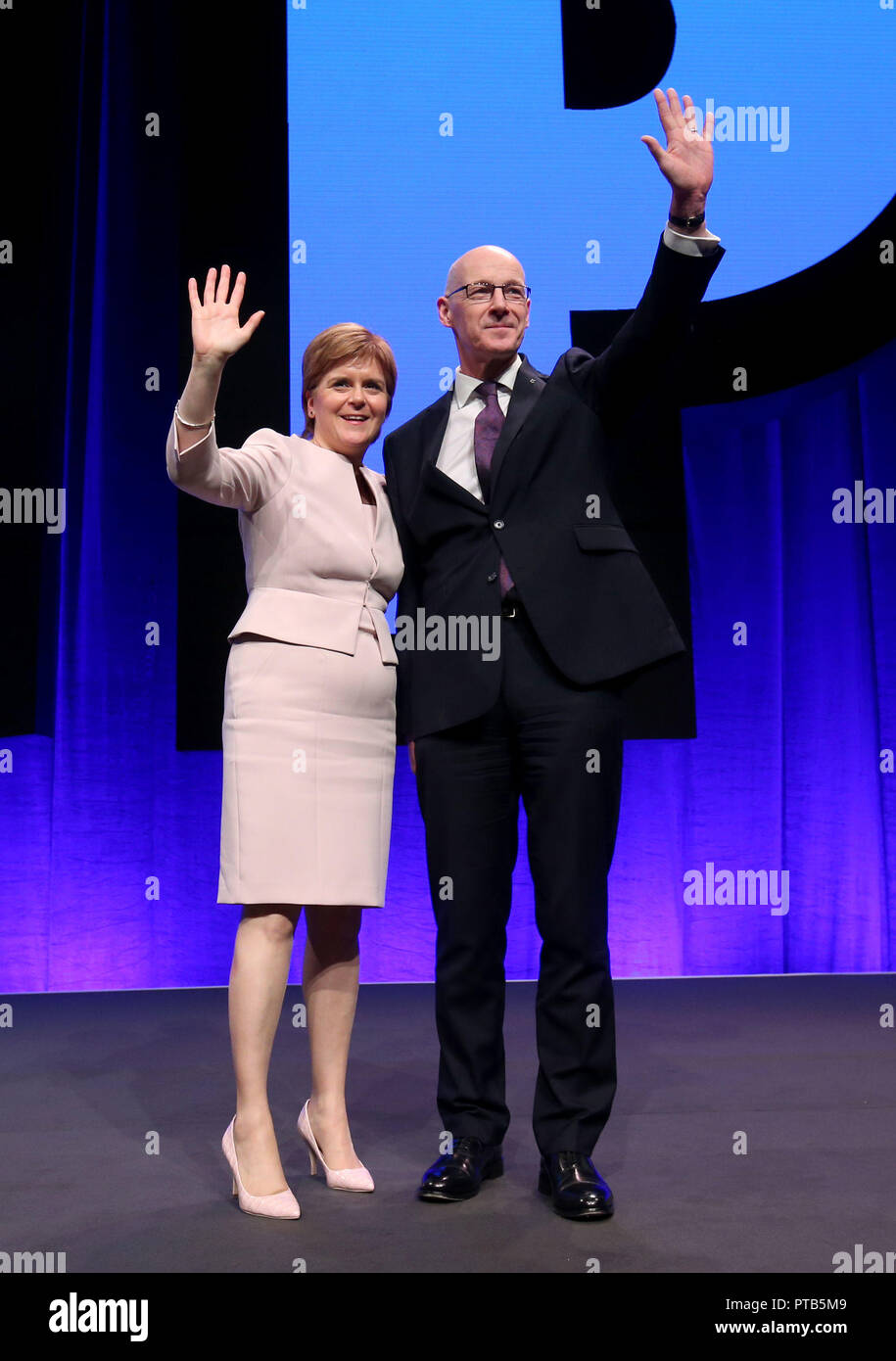 First Minister Nicola Sturgeon and Deputy First Minister John Swinney during day two of the SNP autumn conference at the SEC, Glasgow. Stock Photo