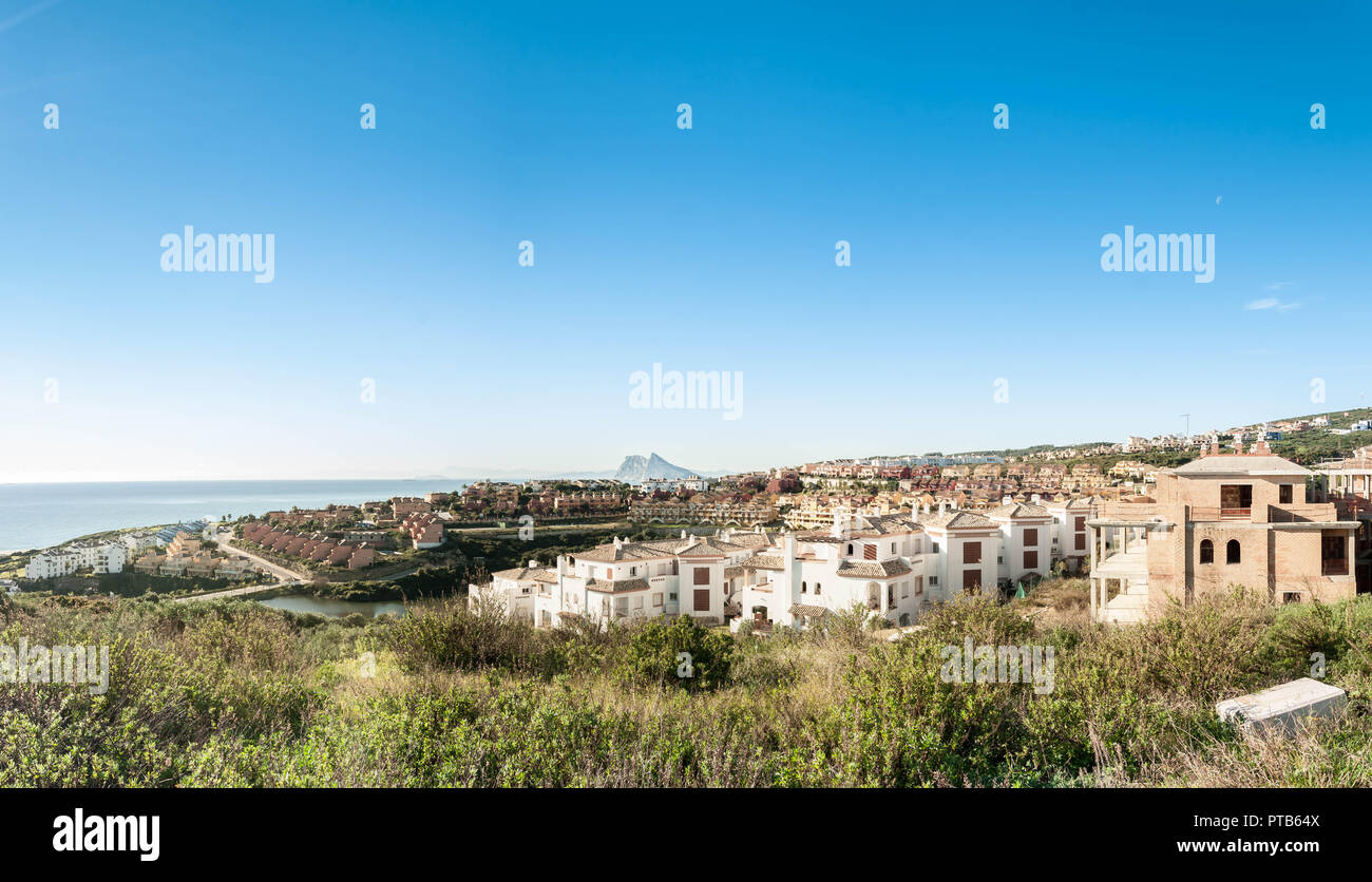 Beach and golf field in La Alcaidesa, Costa del Sol, Spain with Gibraltar in the horizon Stock Photo