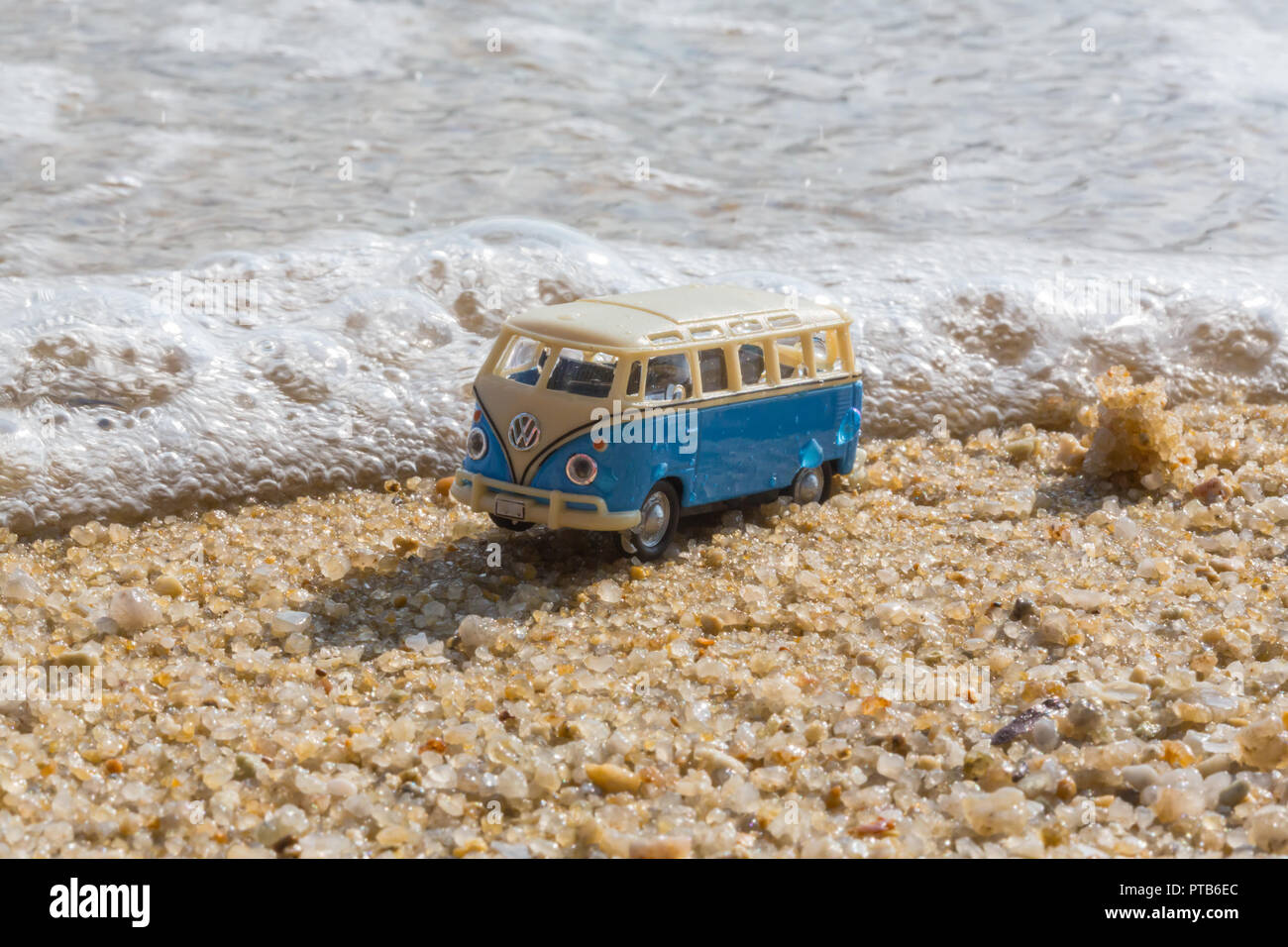 Summer vacation on tropical island on the background vintage car van bus volkswagen with suitcase, beautiful nature with sea ocean water Stock Photo