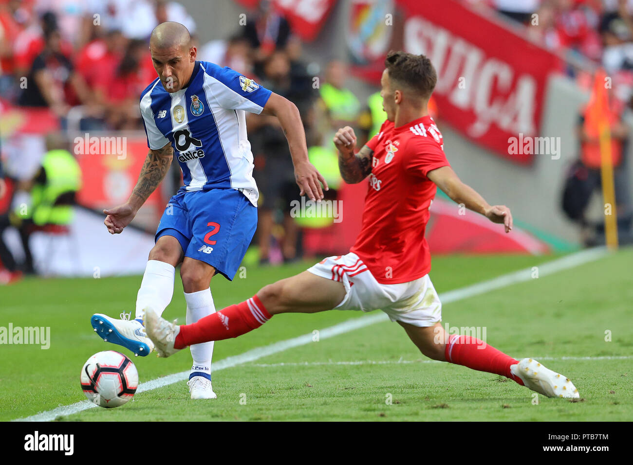 Maxi Pereira of FC Porto (L) with Álex Grimaldo of SL Benfica (R) seen in action during League NOS 2018/19 football match between SL Benfica vs FC Porto. (Final score: SL Benfica 1-0 FC Porto) Stock Photo