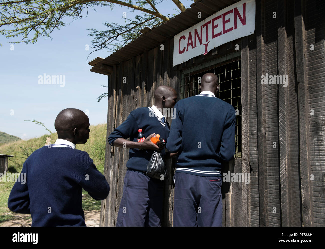 Lake Nakuru National Park, Kenya - October, 2016. African students buying sweets from the shop during their school trip. Stock Photo