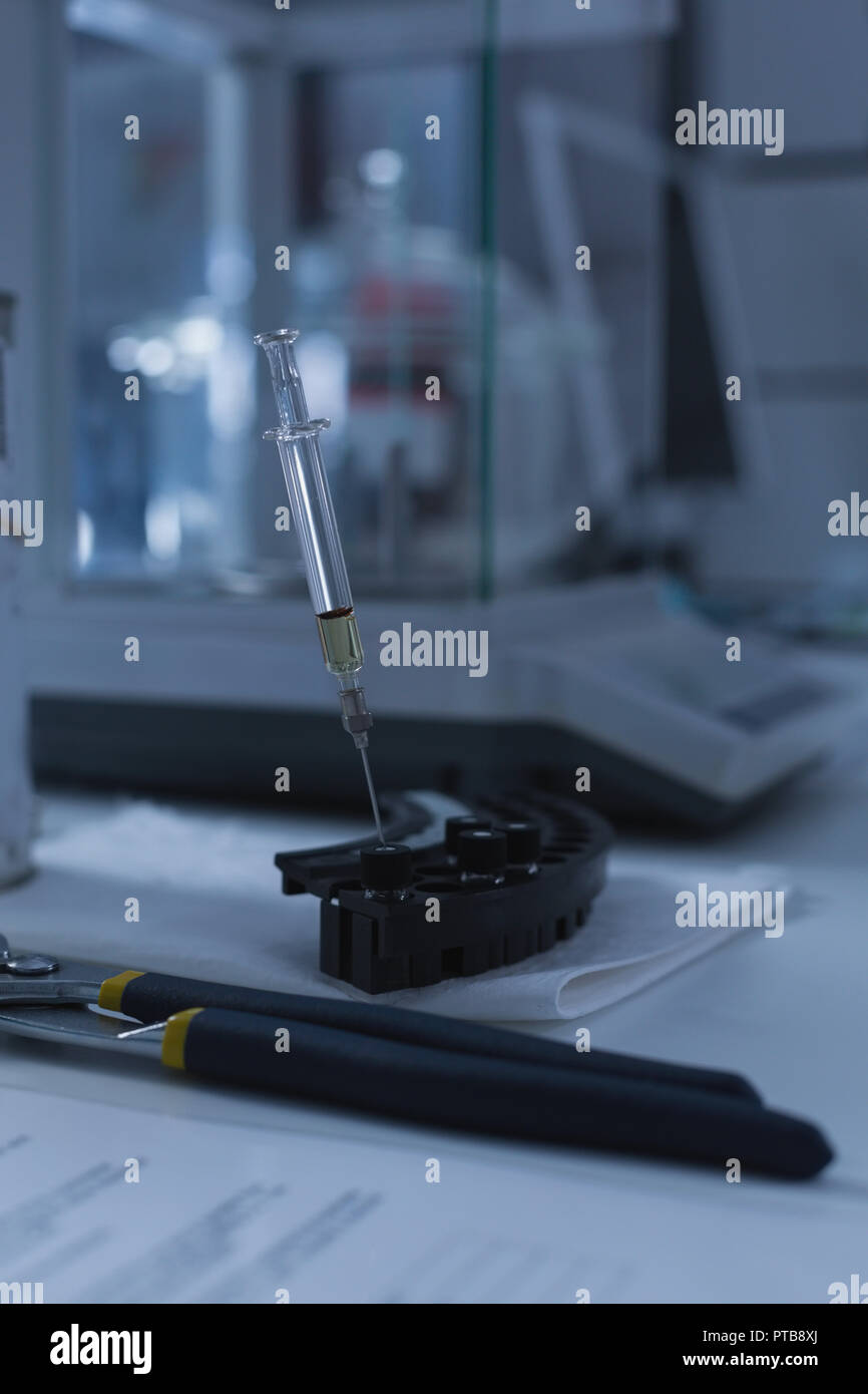 Syringe and equipment in laboratory Stock Photo Alamy