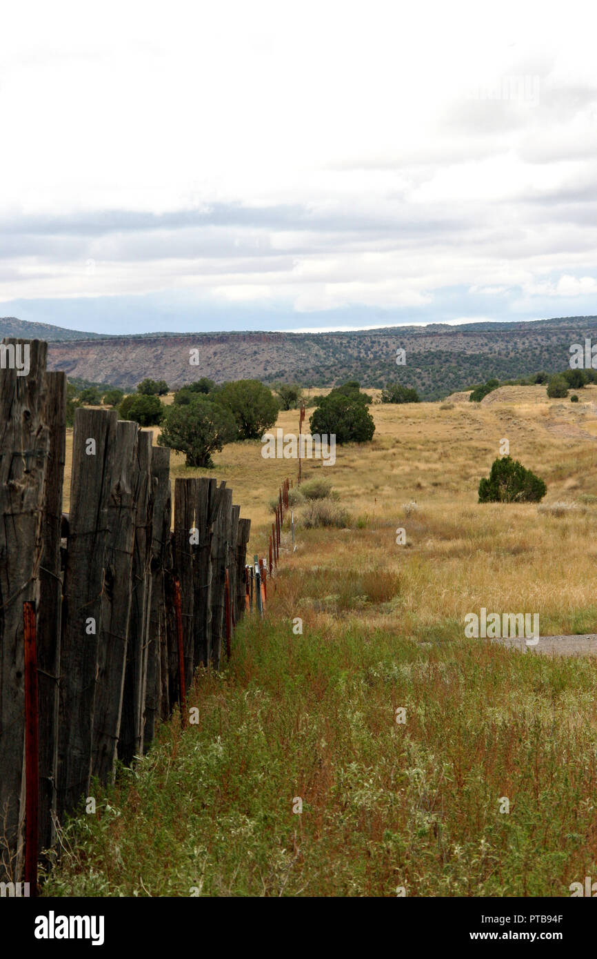 RIde the ranch fence line Arizona high desert Stock Photo