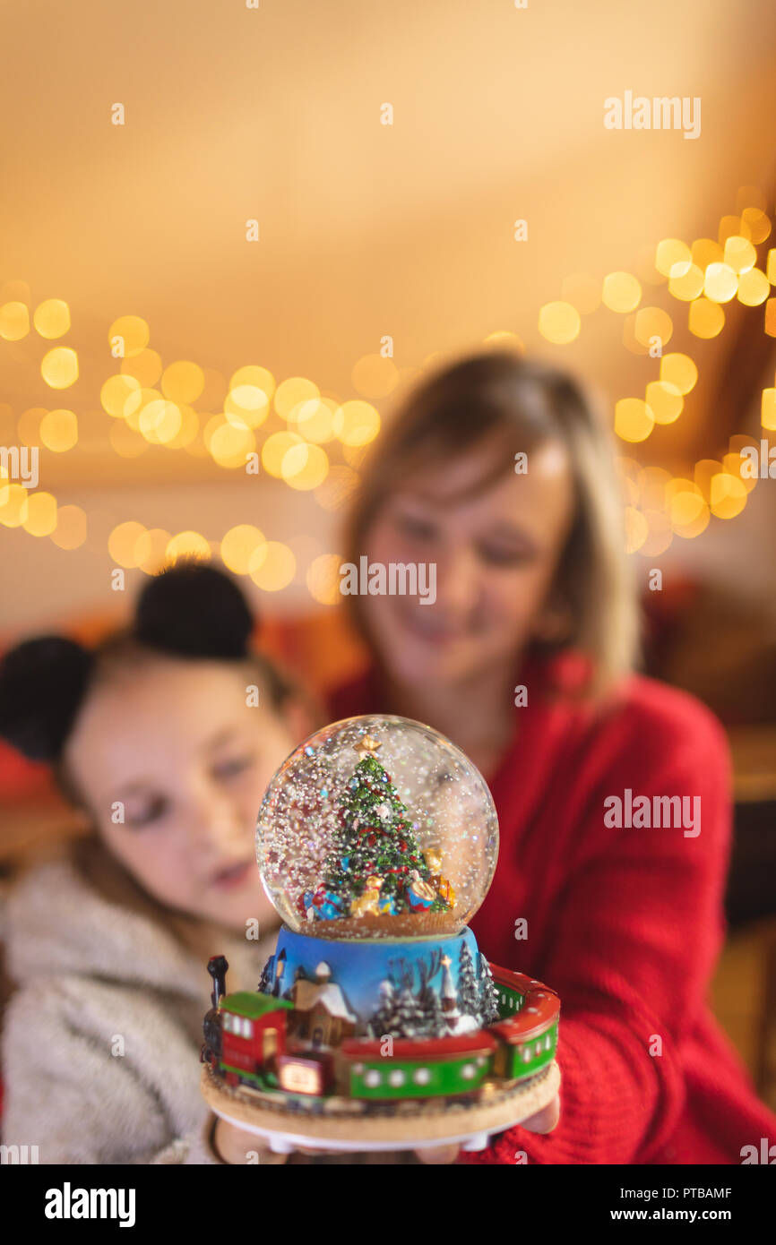 mother and daughter snow globe