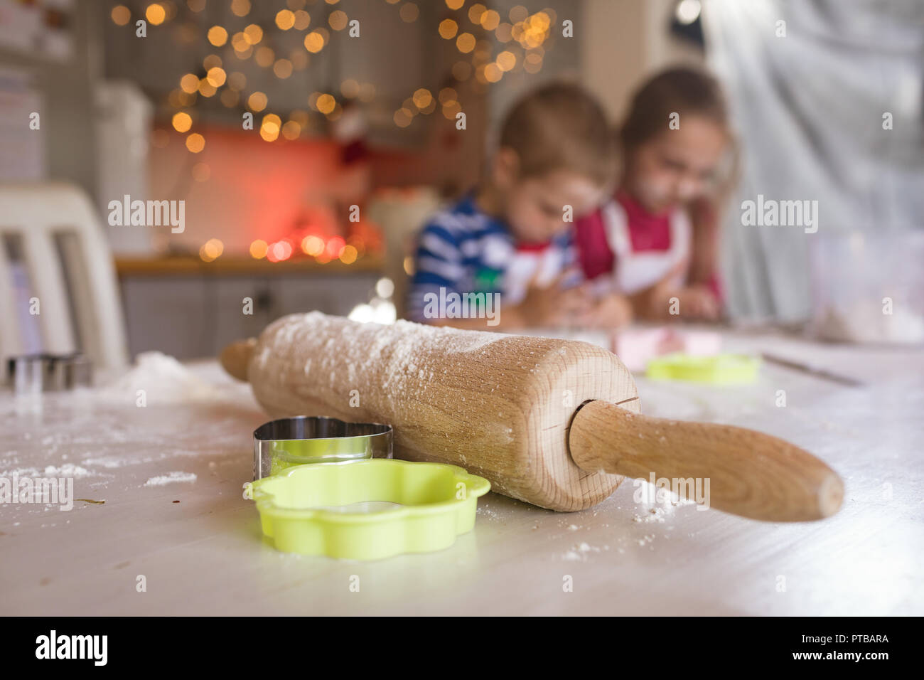 Rolling pin and cookie cutter in the kitchen Stock Photo