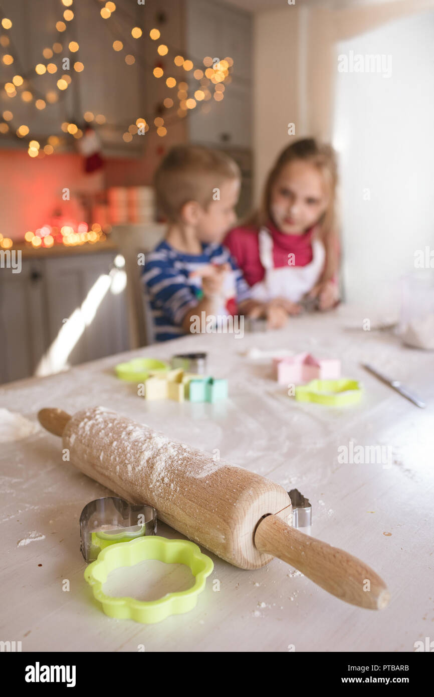 Rolling pin and cookie cutter in the kitchen Stock Photo