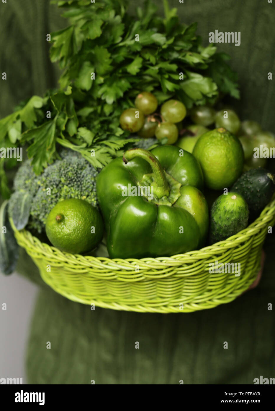 green vegetables and fruits in a wicker basket Stock Photo - Alamy
