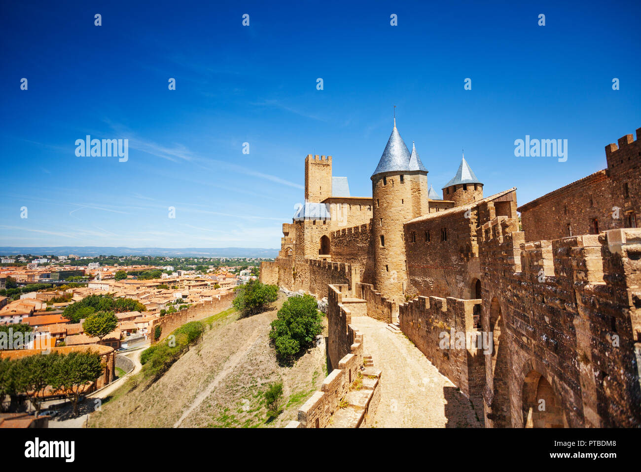 Porte d'Aude close to the Chateau Comtal at western walls of medieval fort, Carcassonne, France Stock Photo