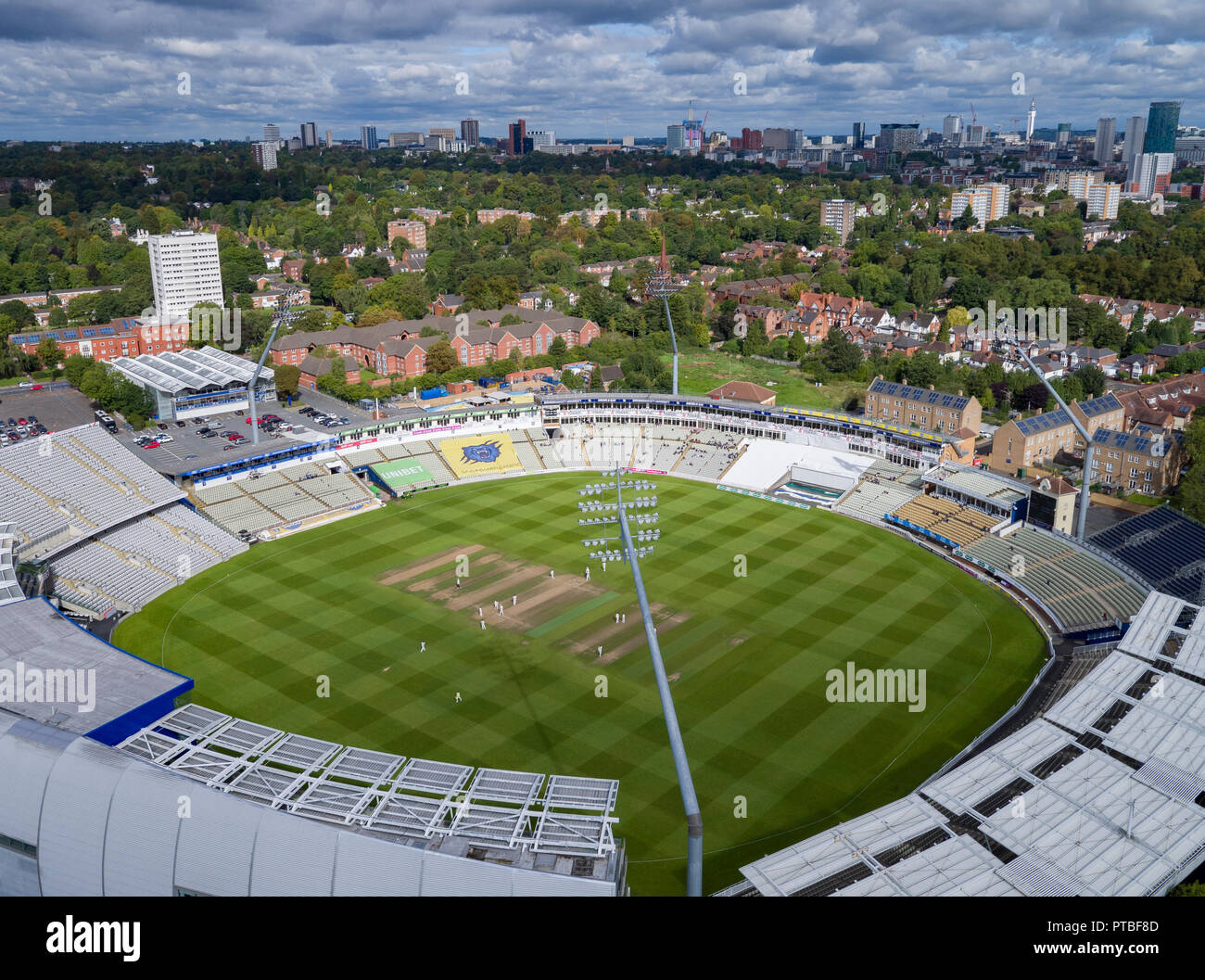 An aerial view of Edgbaston Cricket Club ground, home of Warwickshire County Cricket Club showing the Birmingham City Centre skyline. Stock Photo