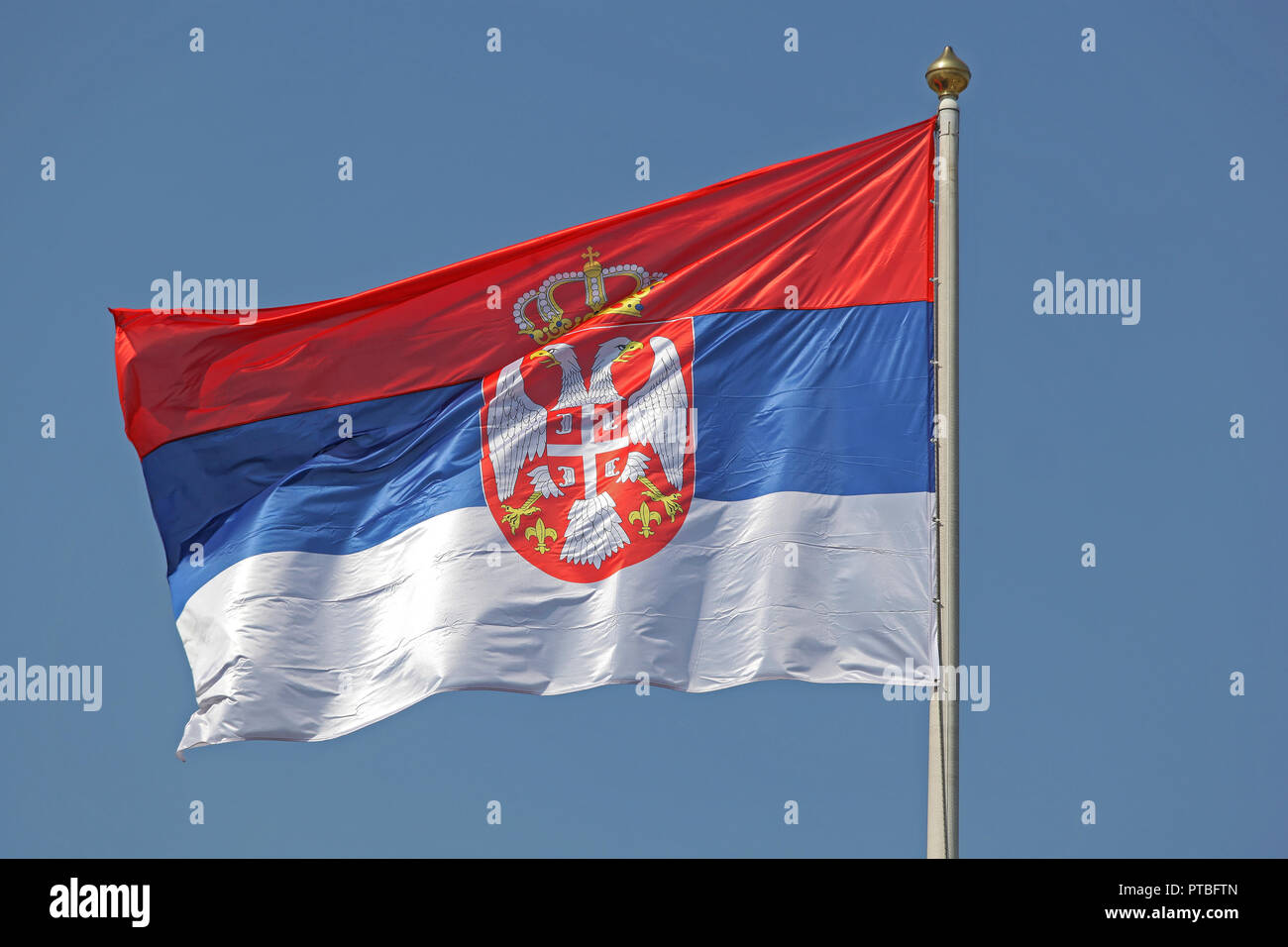 Flaf of Serbia With White Eagles and Crown Stock Photo