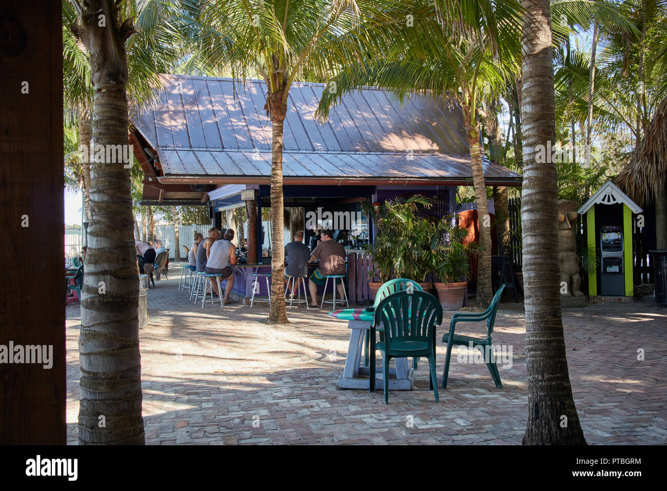 Outdoor bar at the Square Grouper Tiki Bar in Jupiter, Florida Stock