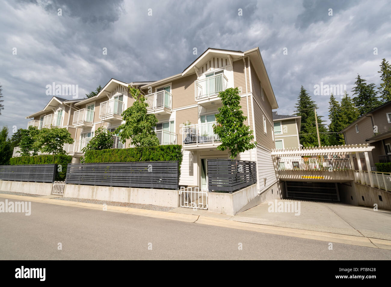 Residential Apartment Building With Concrete Driveway To