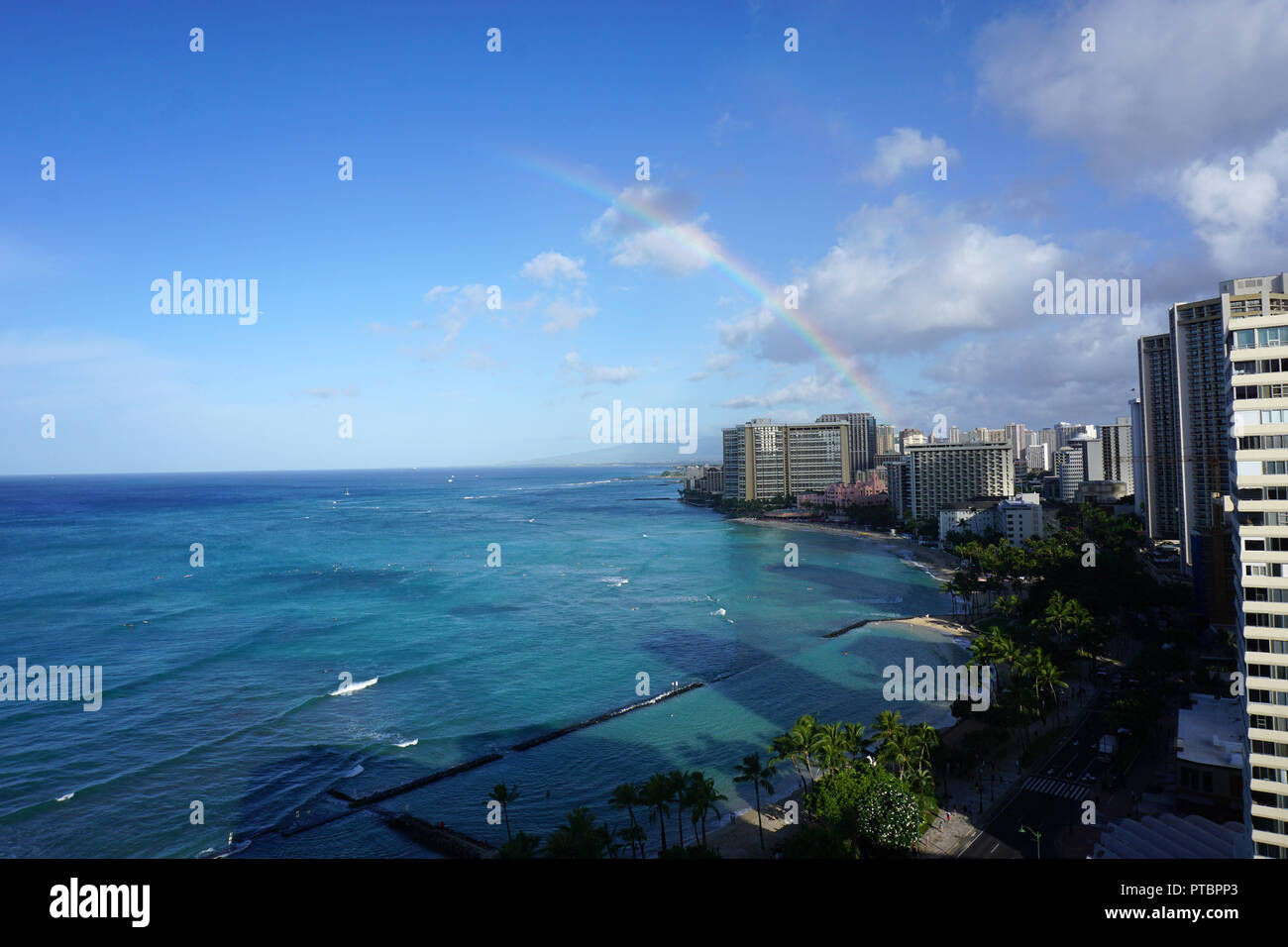 Rainbow over Waikiki Beach Stock Photo
