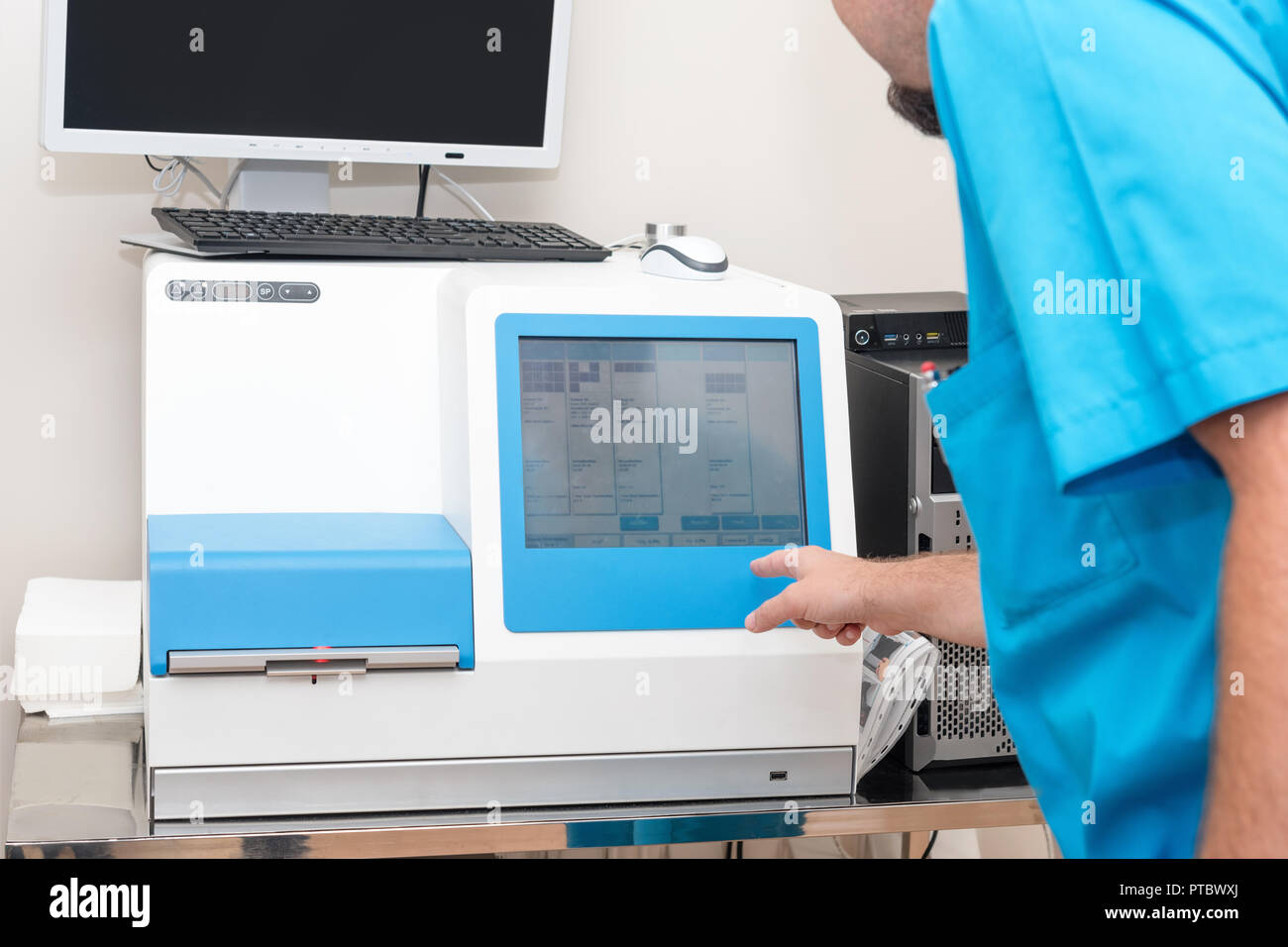 Embryologist or lab technician working with human egg under the