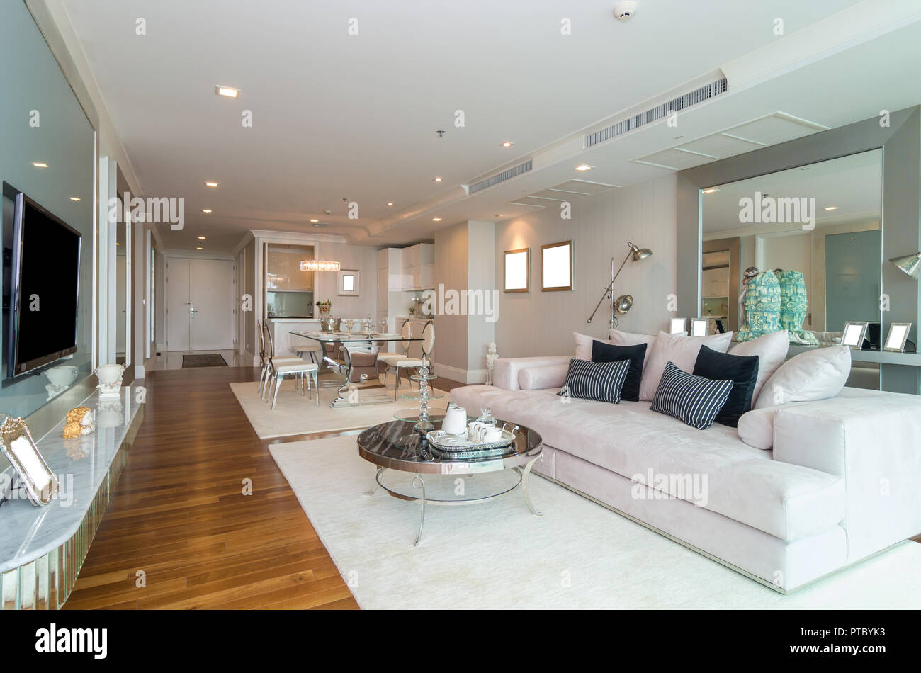 BANGKOK, THAILAND - APRIL 25 :  Luxury Interior living room with kitchen zone and restaurant set at My resort as river condominium beside the chao phr Stock Photo