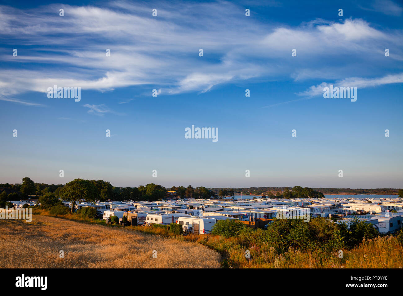 Camper trailers at holiday RV park in Southern Norway seacoast at high season Stock Photo