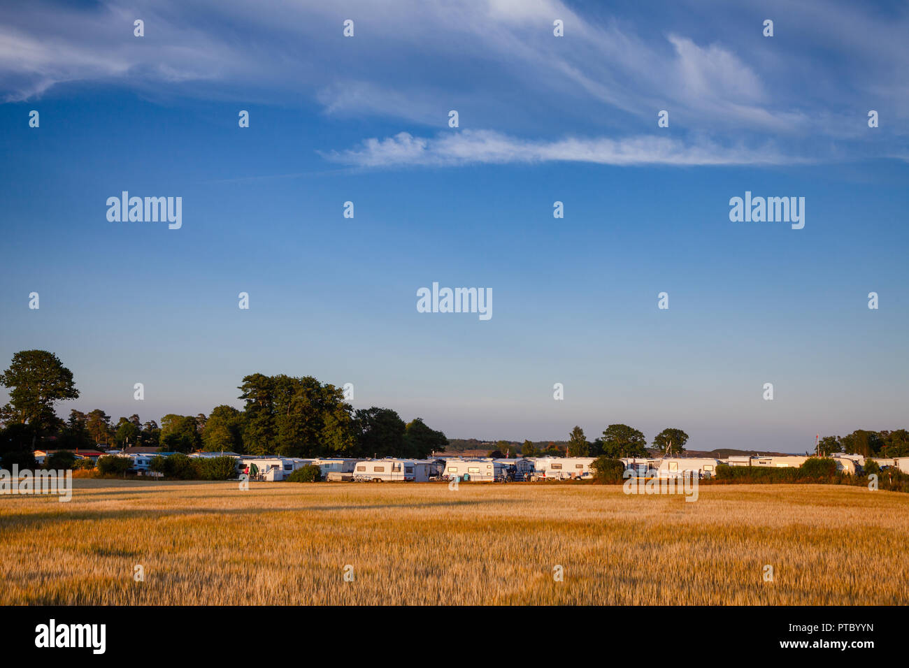 Camper trailers at holiday RV park in Southern Norway seacoast at high season Stock Photo