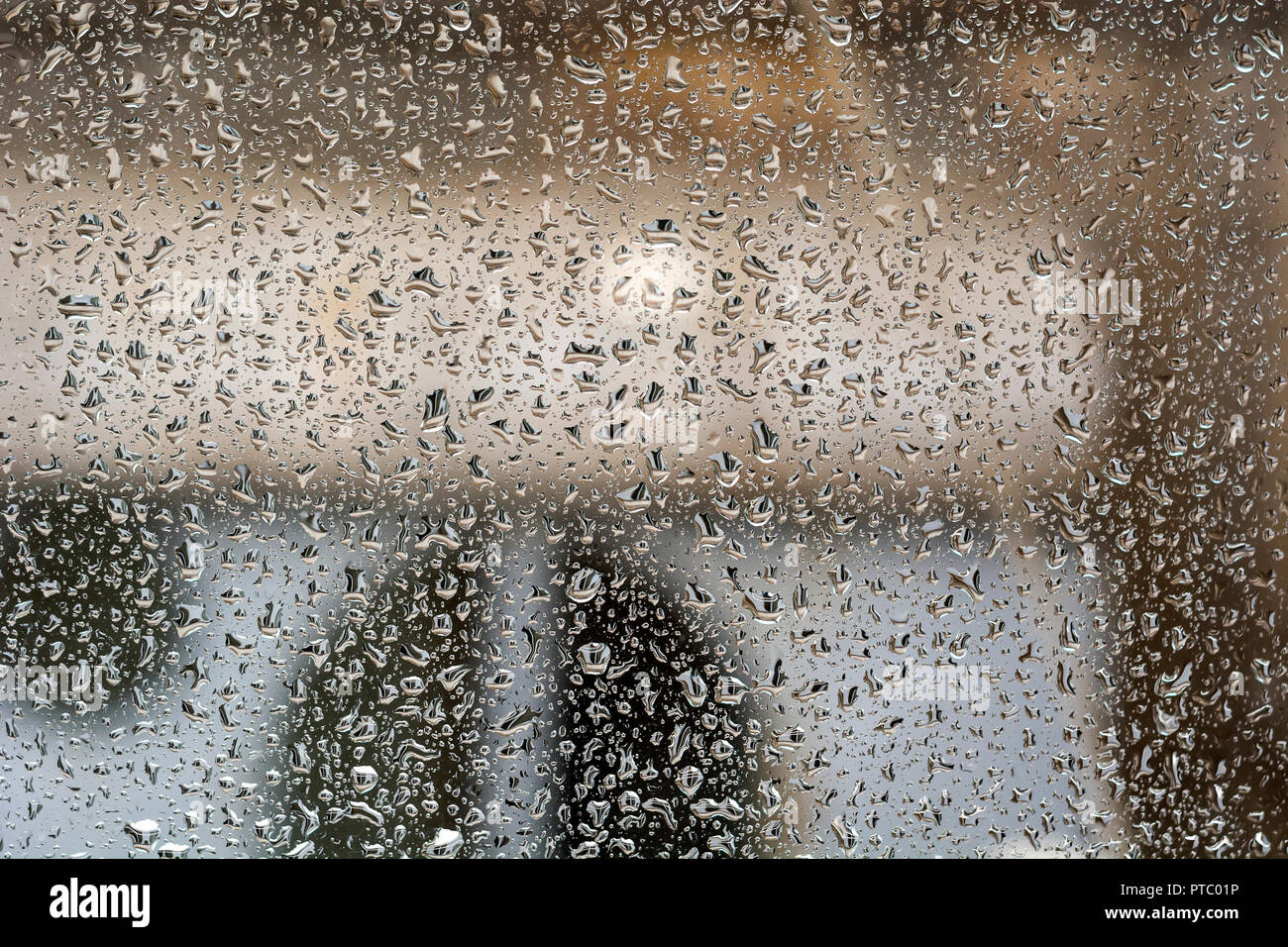 Raindrops on the window, abstract background. Seasonal concept Stock Photo