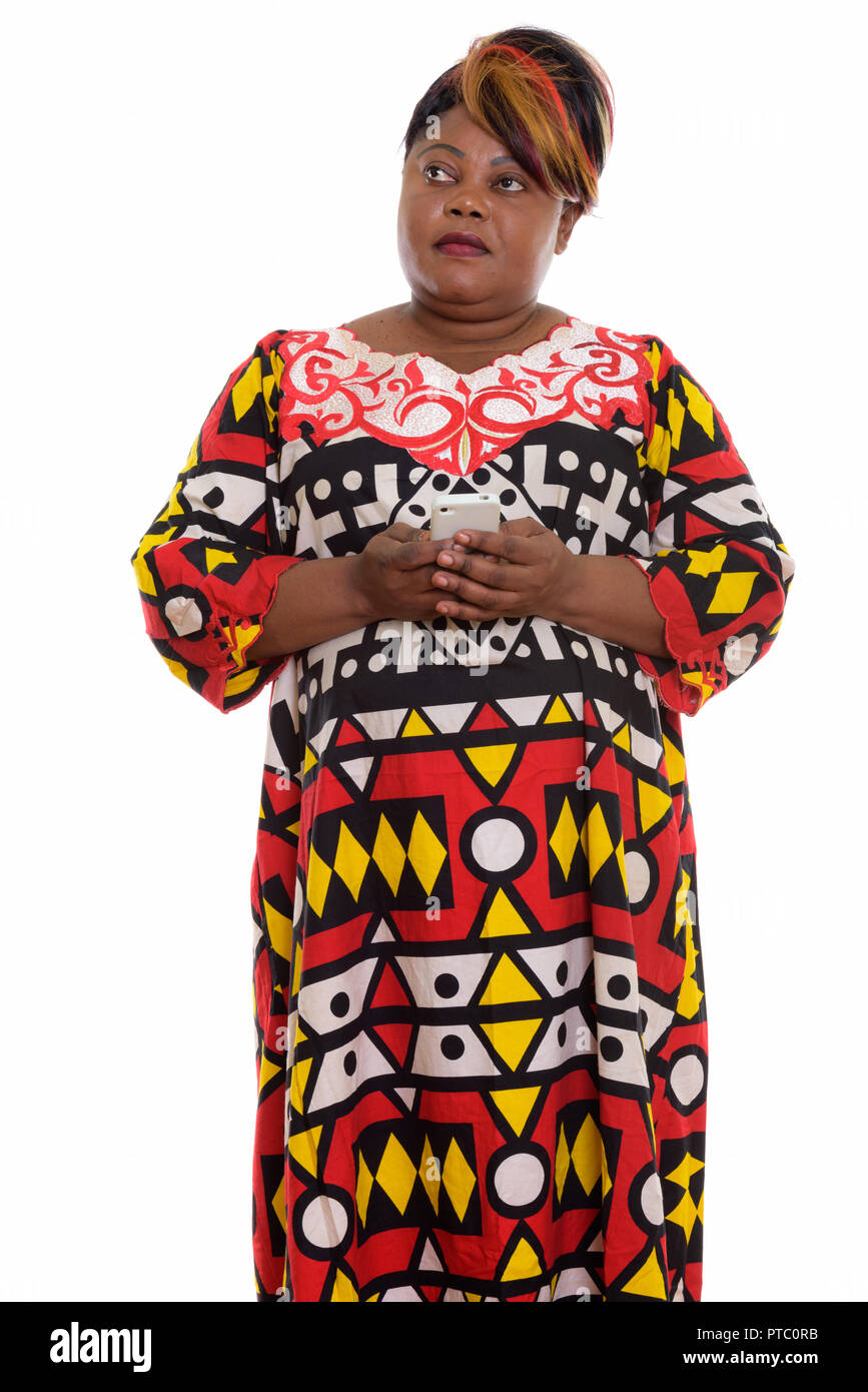 Studio shot of fat black African woman standing while thinking a Stock ...
