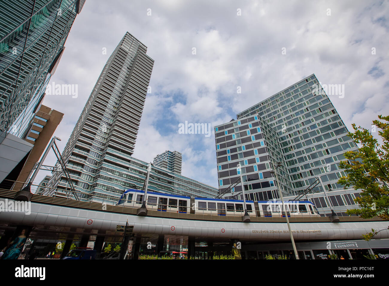 Hague, Netherlands - July 6, 2018: randstadRail light rail tram travelling from The Hague Central Station through city Stock Photo