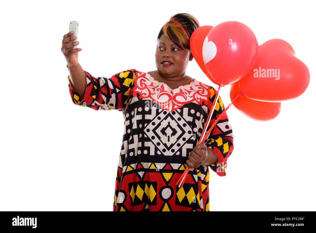 Woman smiling using sign hi-res stock photography and images - Alamy