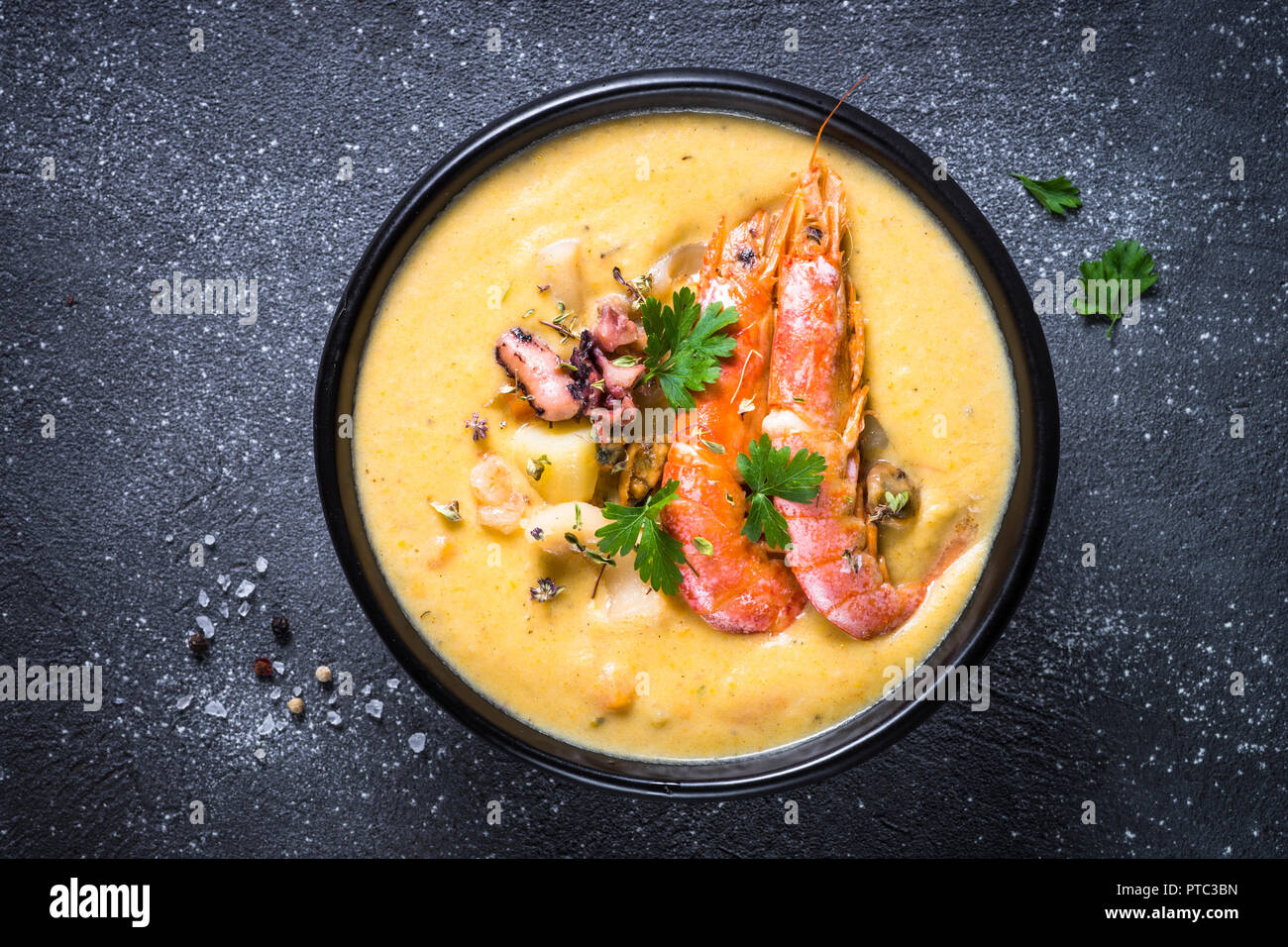 Chowder soup with seafood and prawn shrimps.  Stock Photo