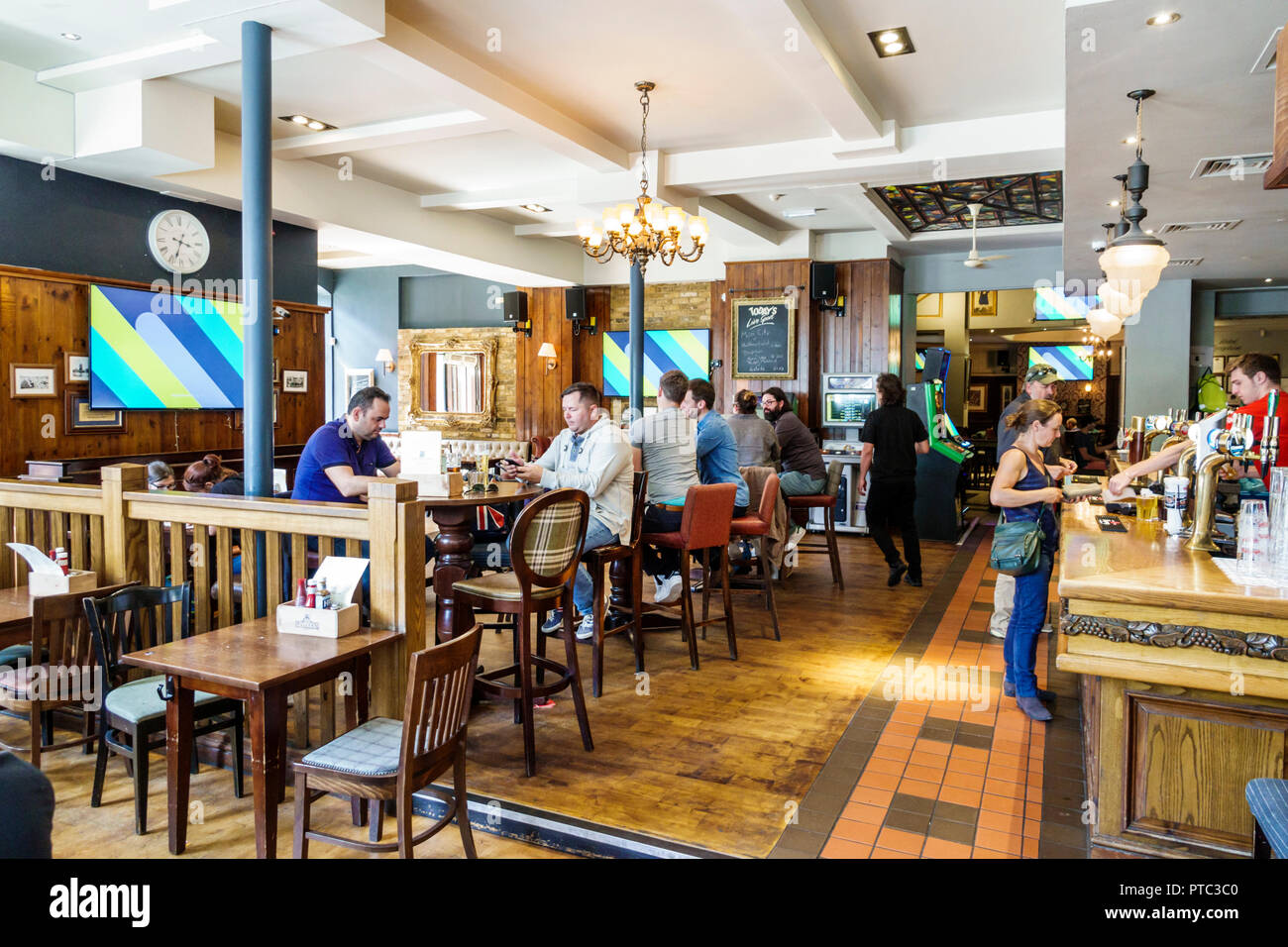 London England,UK,Lambeth,Waterloo,South Bank,The Wellington,hotel,public house,traditional pub,bar lounge pub,man men male,patron,inside interior,UK Stock Photo