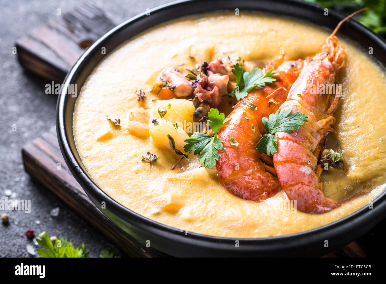 Chowder soup with seafood and prawn shrimps.  Stock Photo