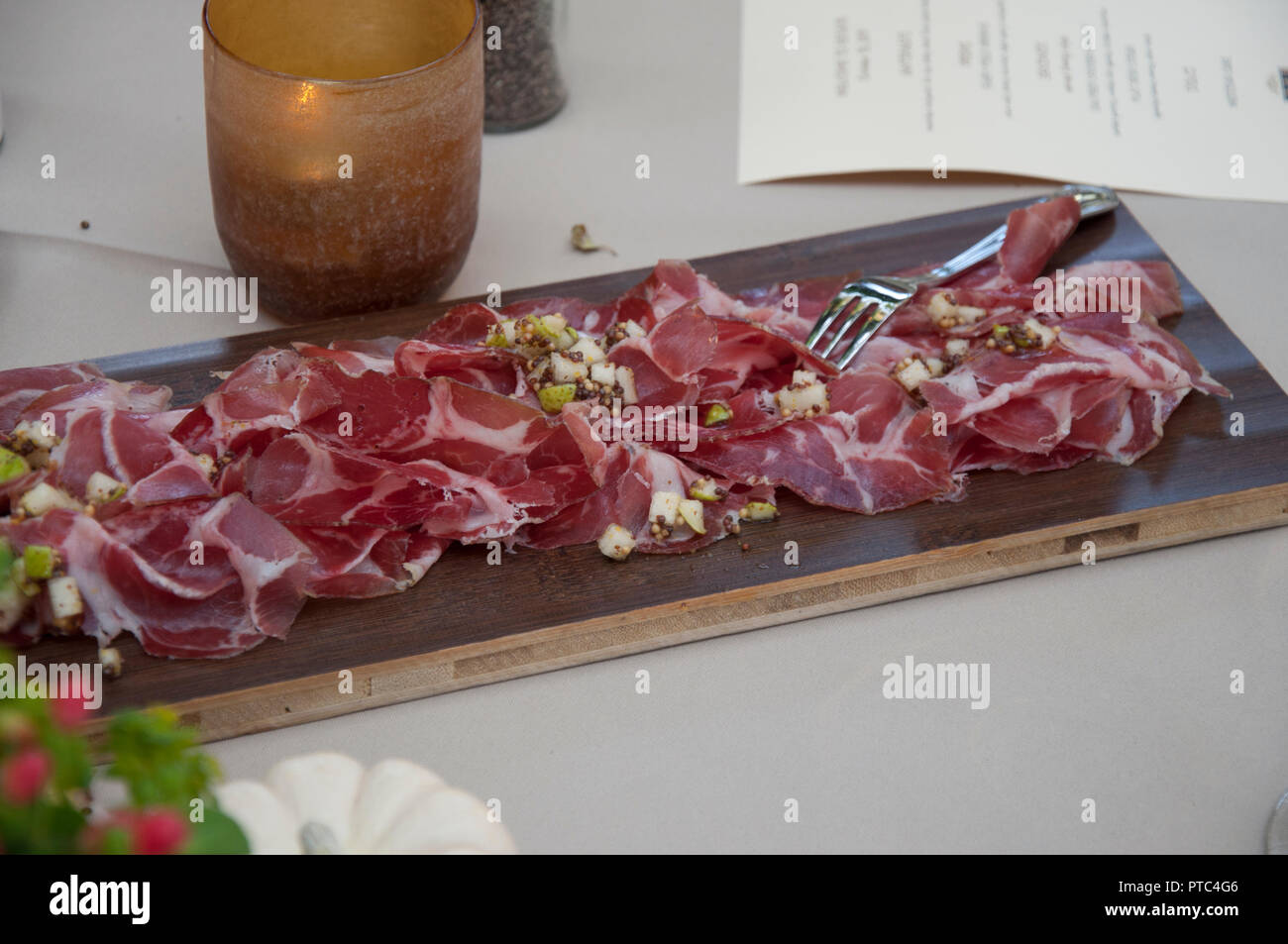 Prosciutto on plank Stock Photo Alamy