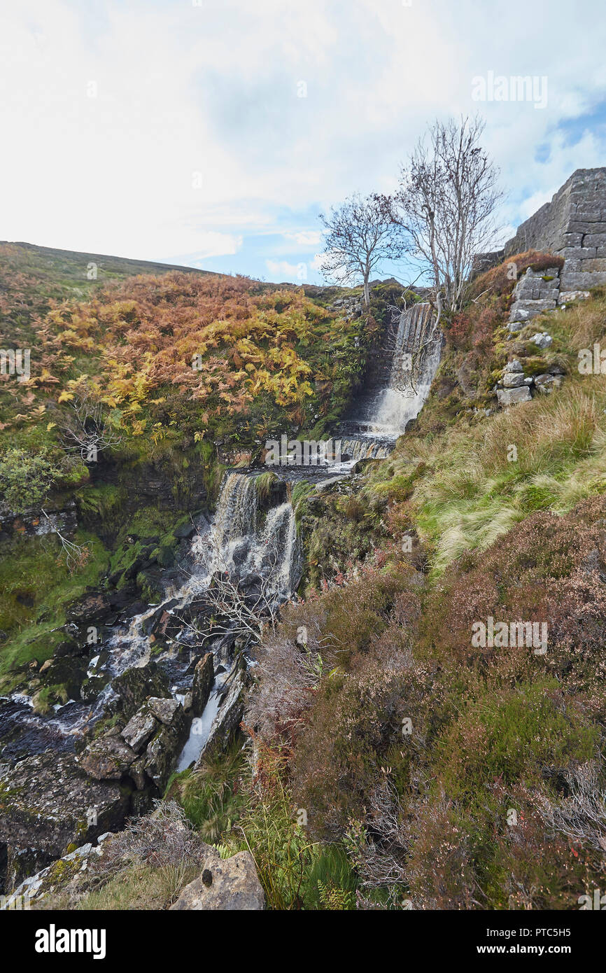 Remains of the Blakethwaite mining dams part of the upper Gunnerside Gill lead mining industry water management system which supplied the dressing flo Stock Photo