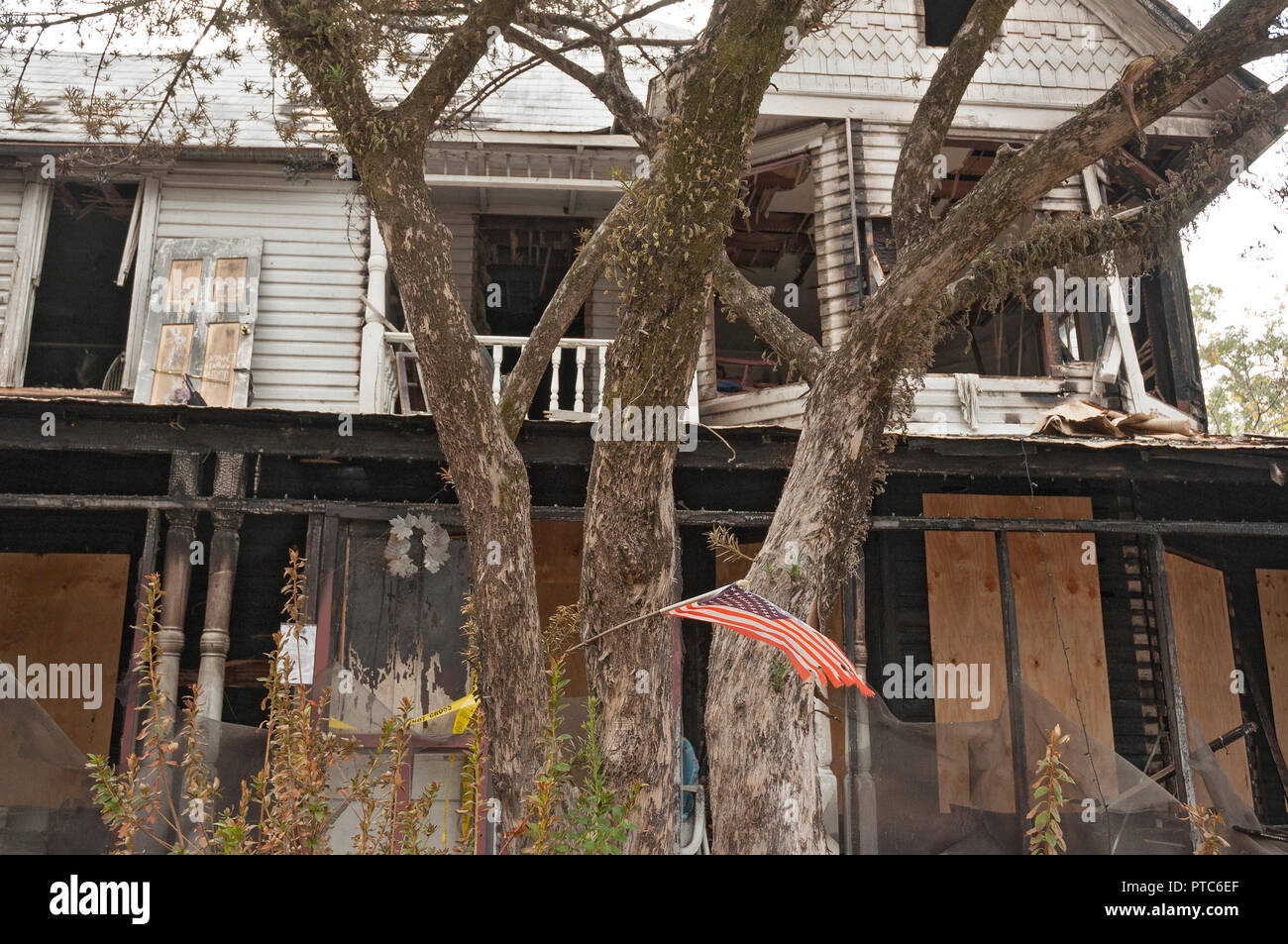 Burned out shell of a two-story vintage home in North Florida Stock ...