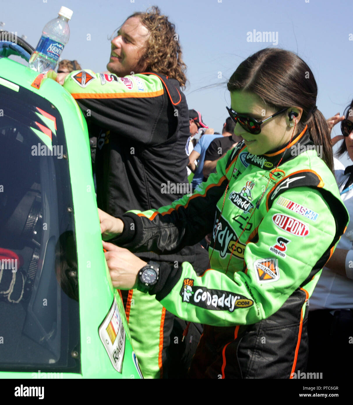 Danica Patrick checks the inside of her car just prior to the start of the NASCAR Nationwide Drive4COPD 300 at Daytona International Speedway in Daytona Beach, Florida on February 19, 2011. Stock Photo