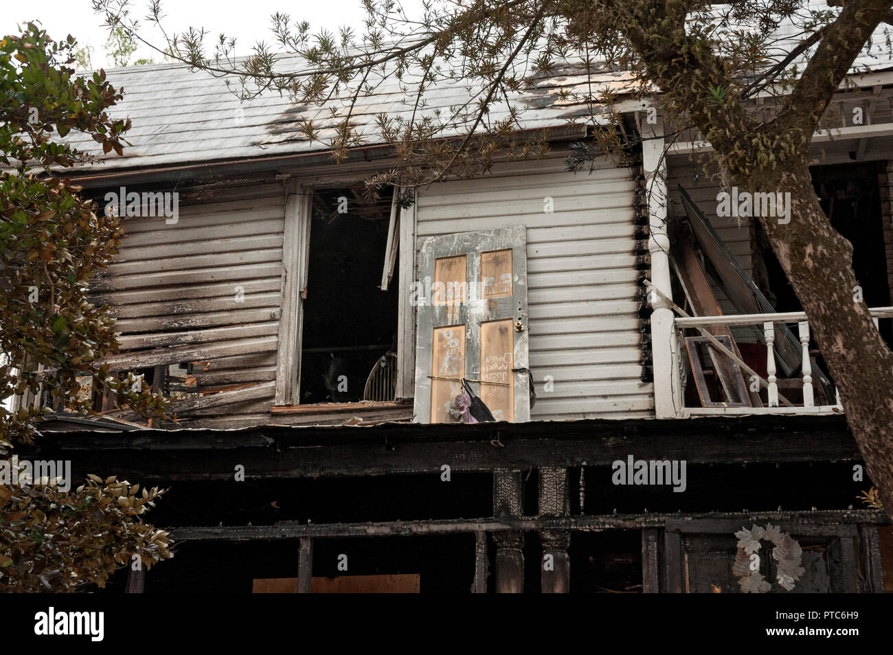 Burned out shell of a two-story vintage home in North Florida Stock ...