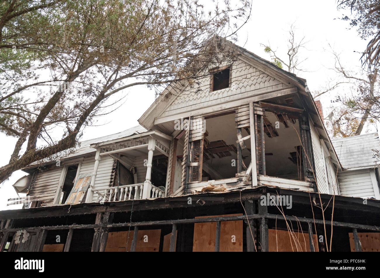 Burned out shell of a two-story vintage home in North Florida Stock ...