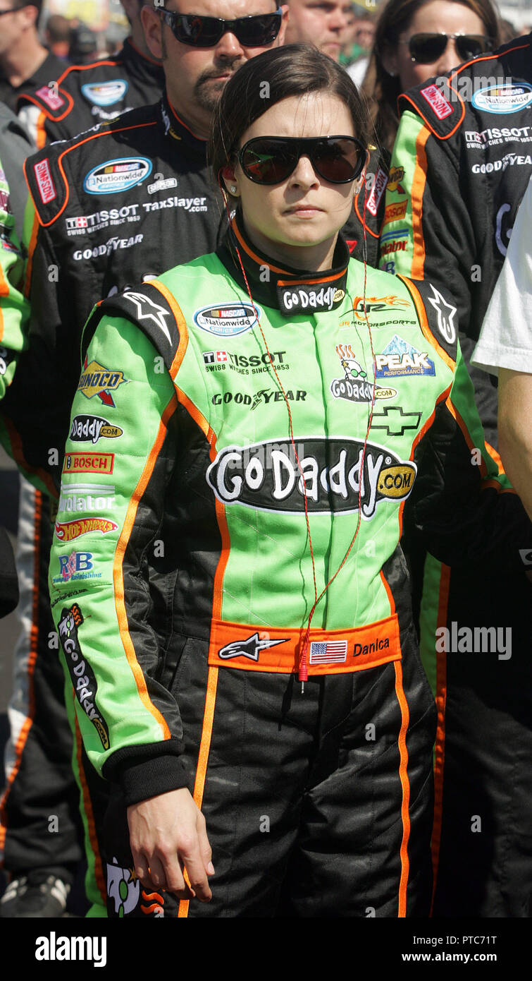 Danica Patrick waits by her car on pit road just prior to the start of the NASCAR Nationwide Drive4COPD 300 at Daytona International Speedway in Daytona Beach, Florida on February 19, 2011. Stock Photo