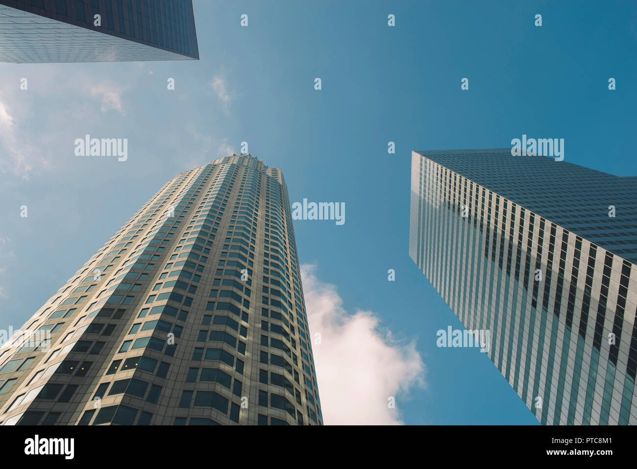 Group of tall city sky scrapers reach to the sky Stock Photo