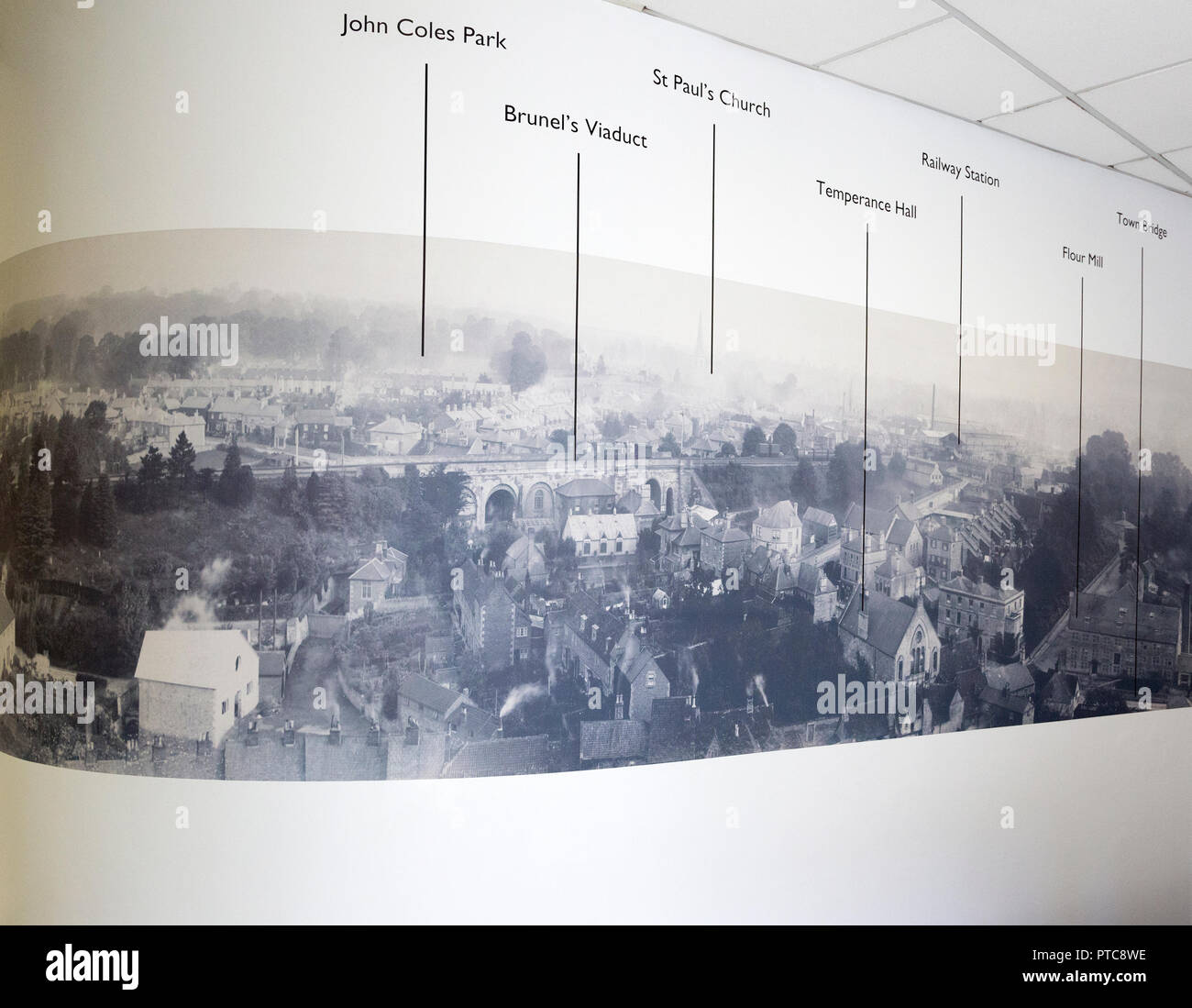 Historic panoramic photograph of local landmarks in town centre, with