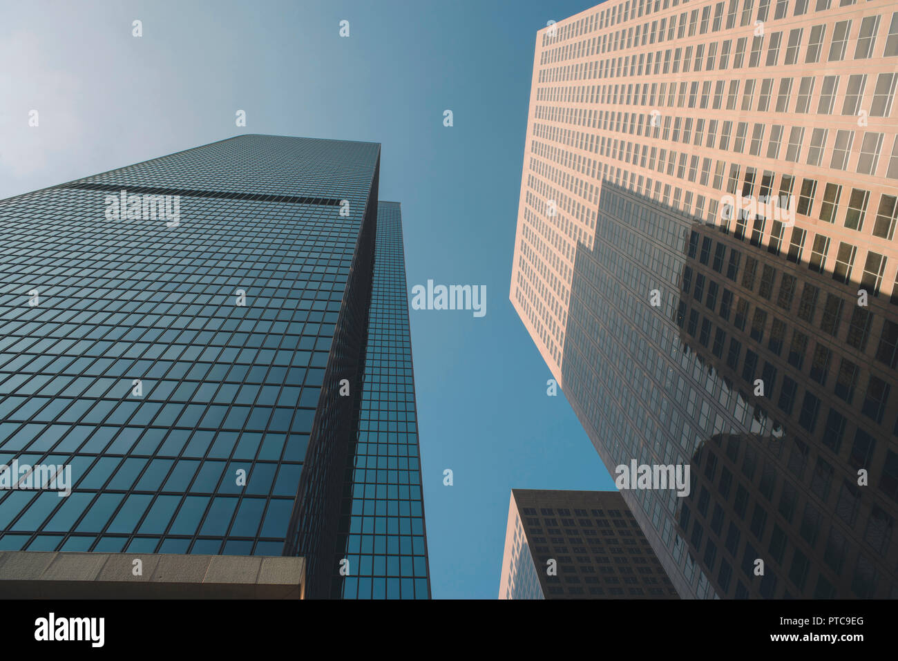 Tall corporate buildings stand in the daylight Stock Photo