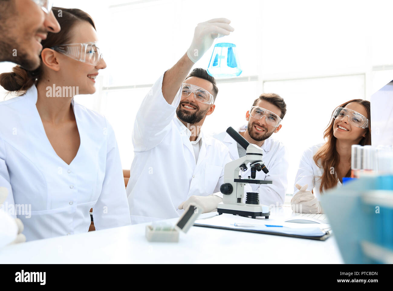 Working In Lab Coworkers in science lab hi-res stock photography and images - Alamy