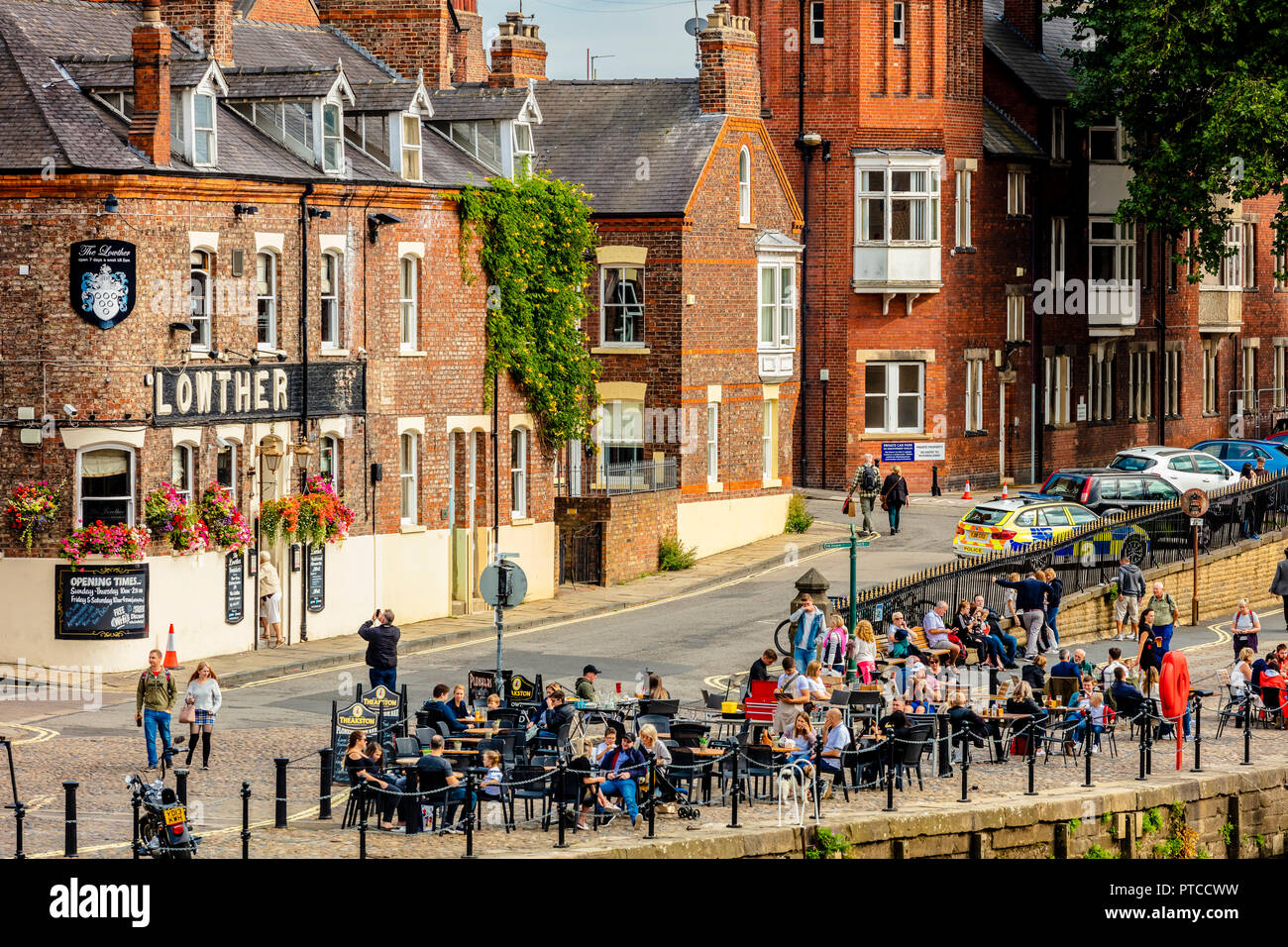 York, UK - August 28 2018: River Ouse urban landscape featuring The Lowther pub and riverside dining social space Stock Photo