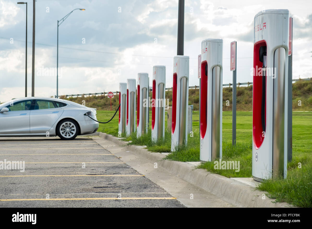 WAXAHACHIE, TEXAS, USA - OCTOBER 1, 2018 - Tesla Destination Charger station located off Interstate I-35. There is a large and growing network of  acc Stock Photo