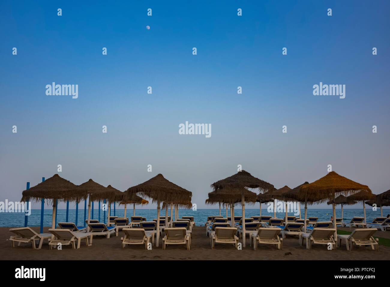 An evening on the beach at Coata del Sol, Fuengirola, Spain. Stock Photo