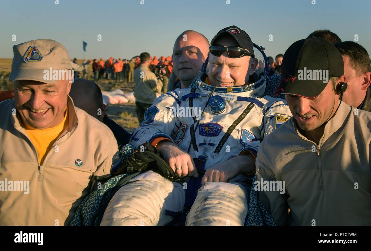 International Space Station Expedition 56 Soyuz Commander Oleg Artemyev is carried to the medical tent shortly after landing aboard the Russian Soyuz MS-08 spacecraft October 4, 2018 near Zhezkazgan, Kazakhstan. Oleg Artemyev along with astronauts Drew Feustel and Ricky Arnold of NASA,are returning after 197 days in space. Stock Photo
