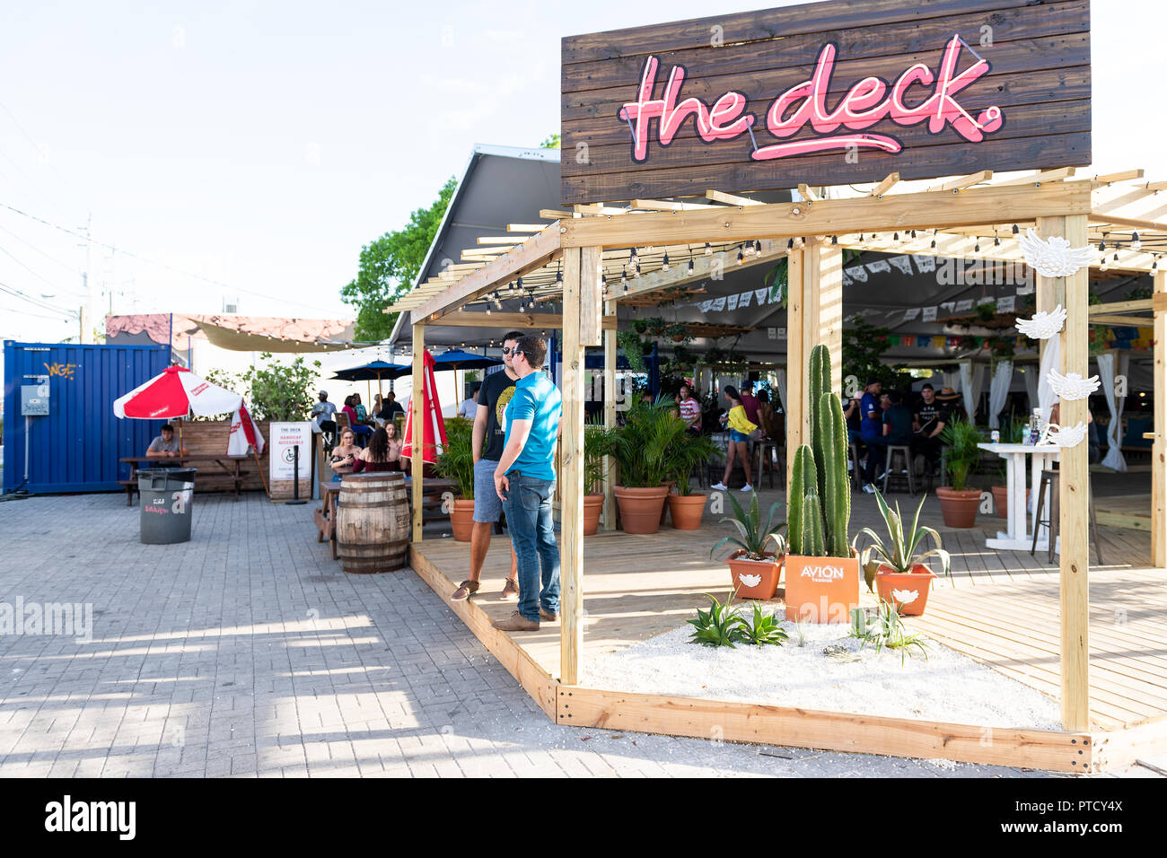Miami, USA - May 6, 2018: The Deck bar, night club, restaurant with live music in Wynwood art district during summer, sunny weather on street Stock Photo