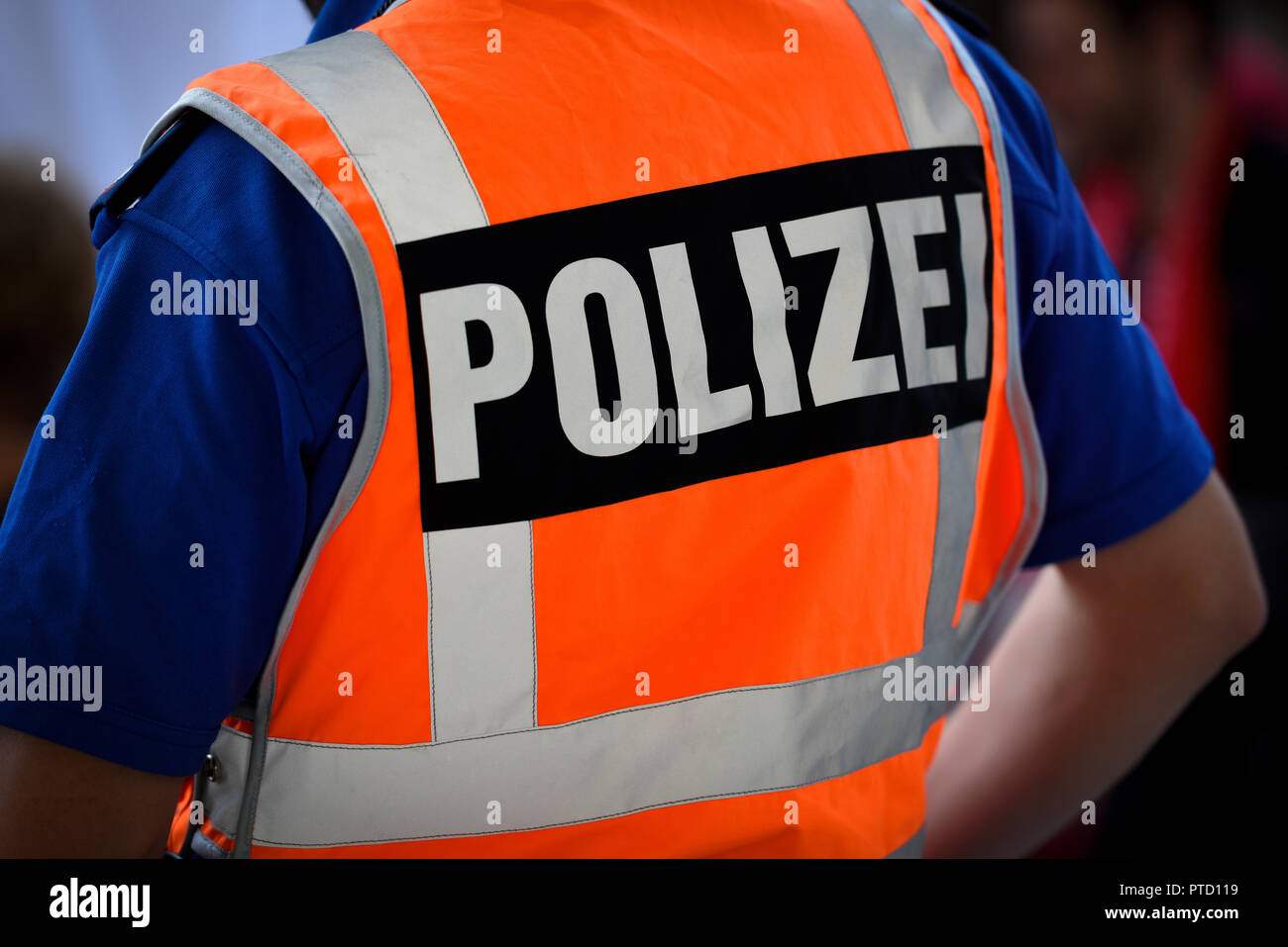 Inscription Police on protective vest, back view, Switzerland Stock Photo