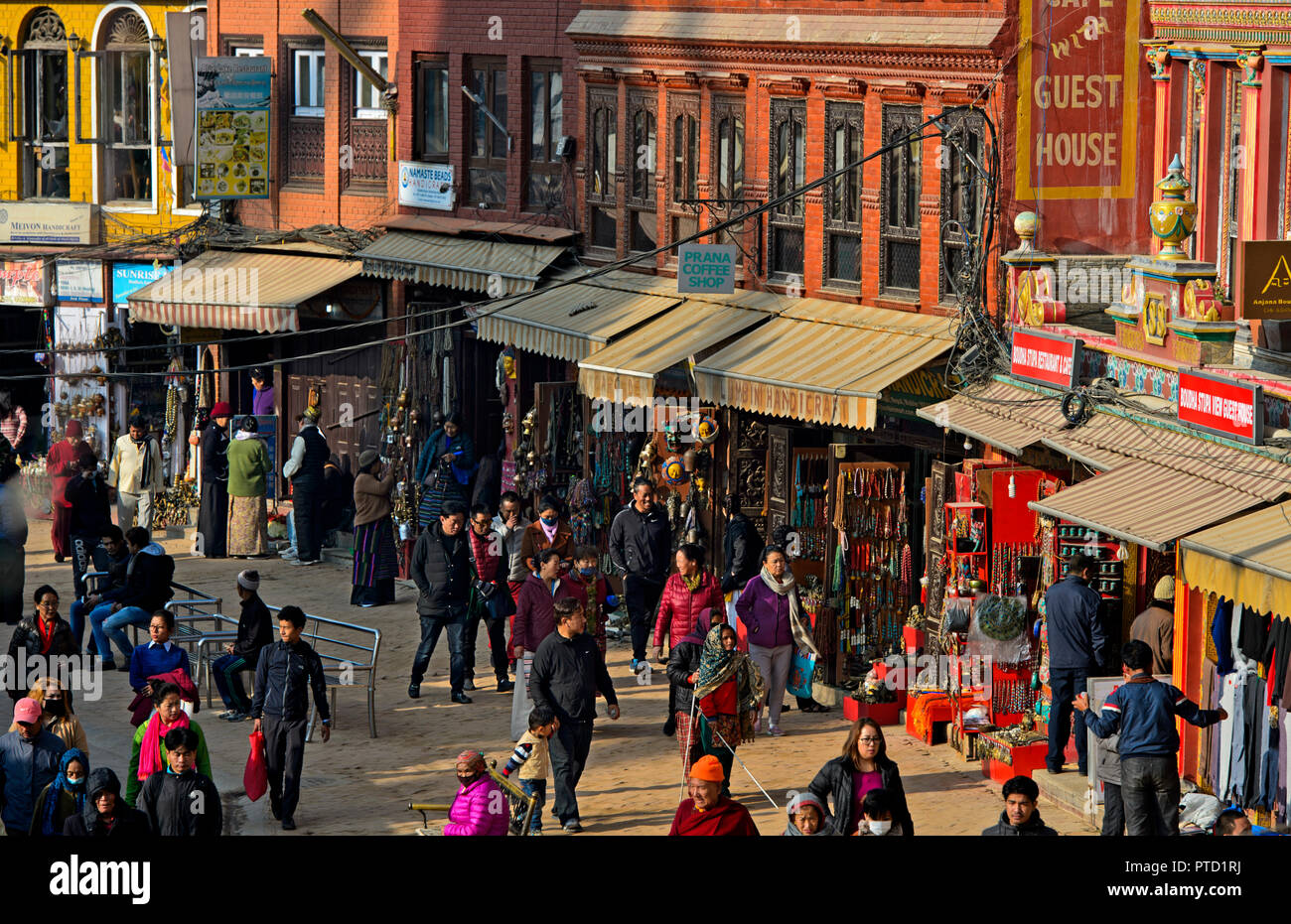 Lively shopping street with locals, restaurants and souvenir shops