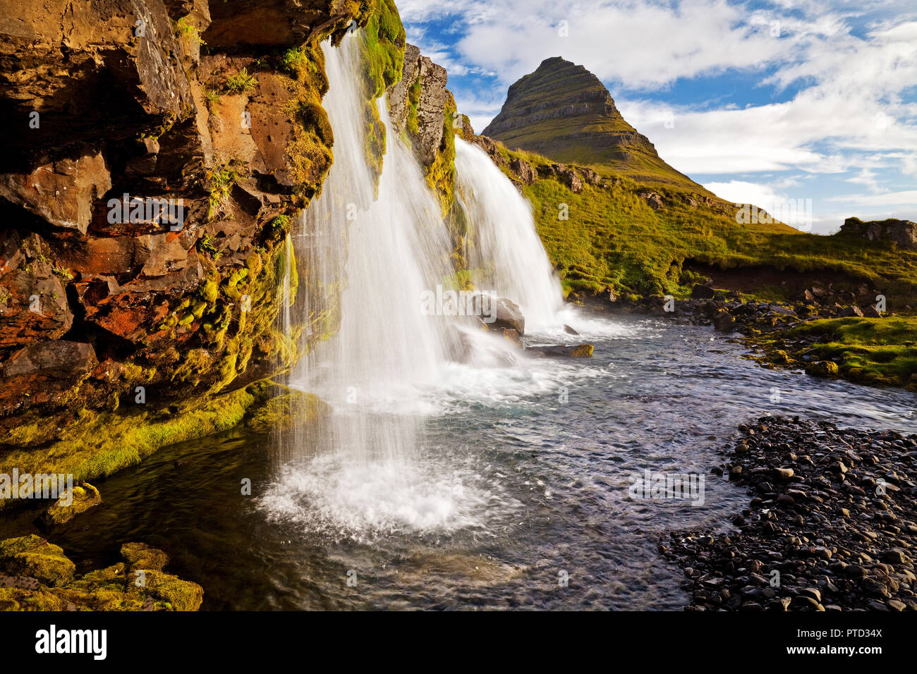 Kirkjufellsfoss Waterfall and Mount Kirkjufell, near Grundarfjördur, Snæfellsnes, Western Iceland, Iceland Stock Photo