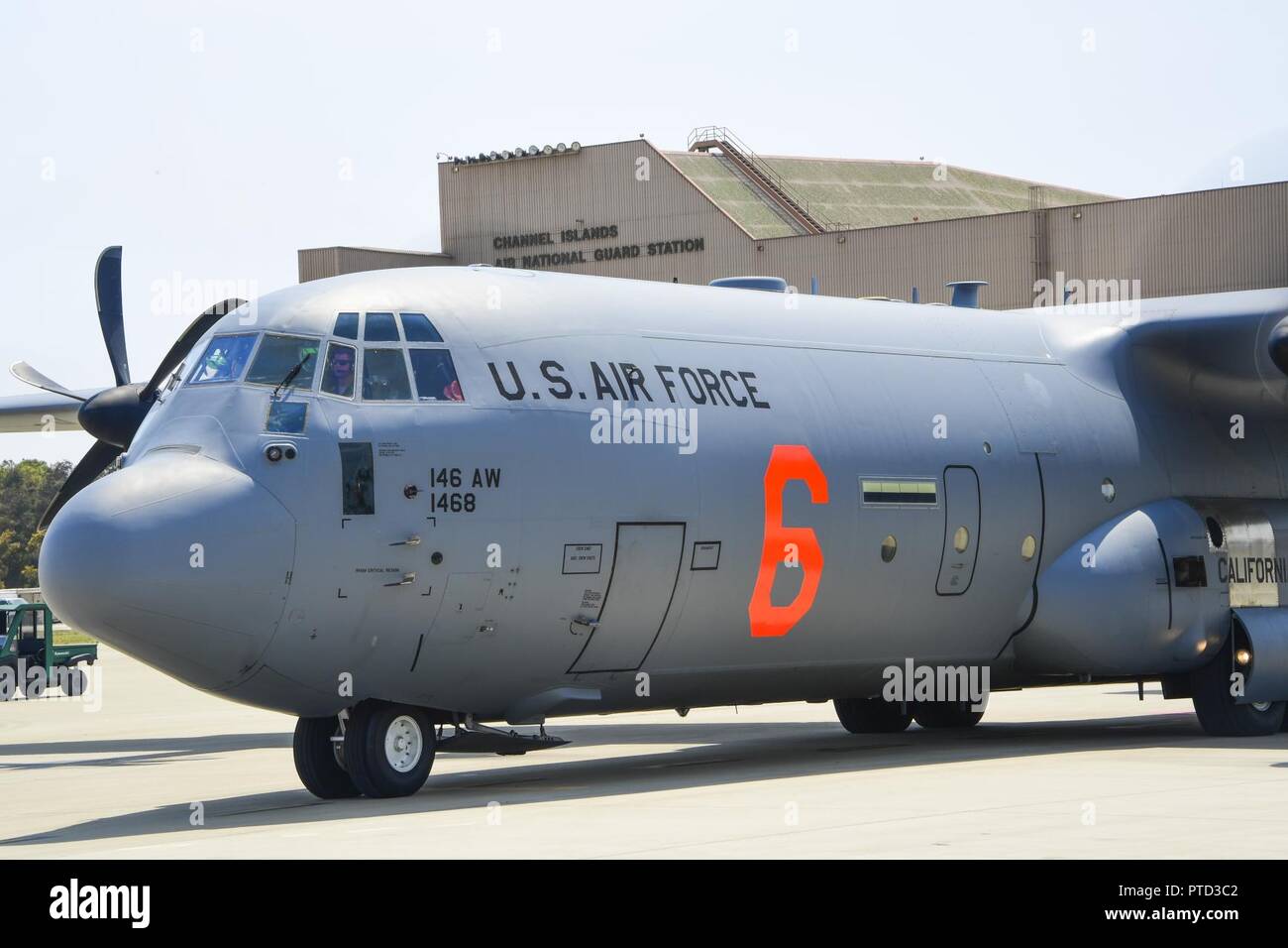 A U.S. Air National Guard C130J aircraft equipped with the MAFFS (Modular Airborne Fire Fighting System) departs the 146th Airlift Wing Port Hueneme California to assist with the containment of the Garza Wildfire blazing near Fresno, California. July 10, 2017. Stock Photo