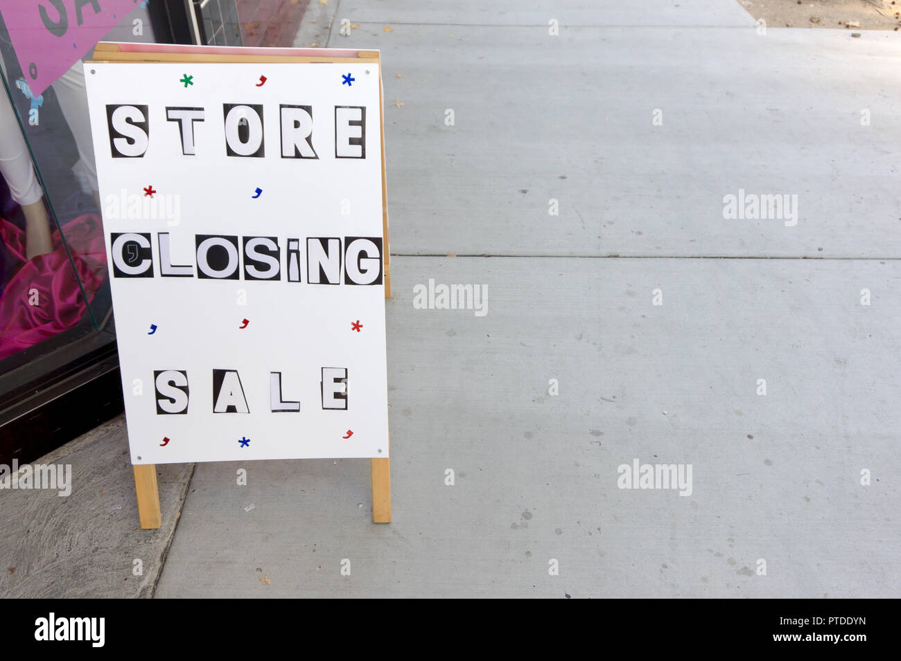 "Everything Must Go" "Blowout Sale" "Store Closing" Signs in store window and on the sidewalk