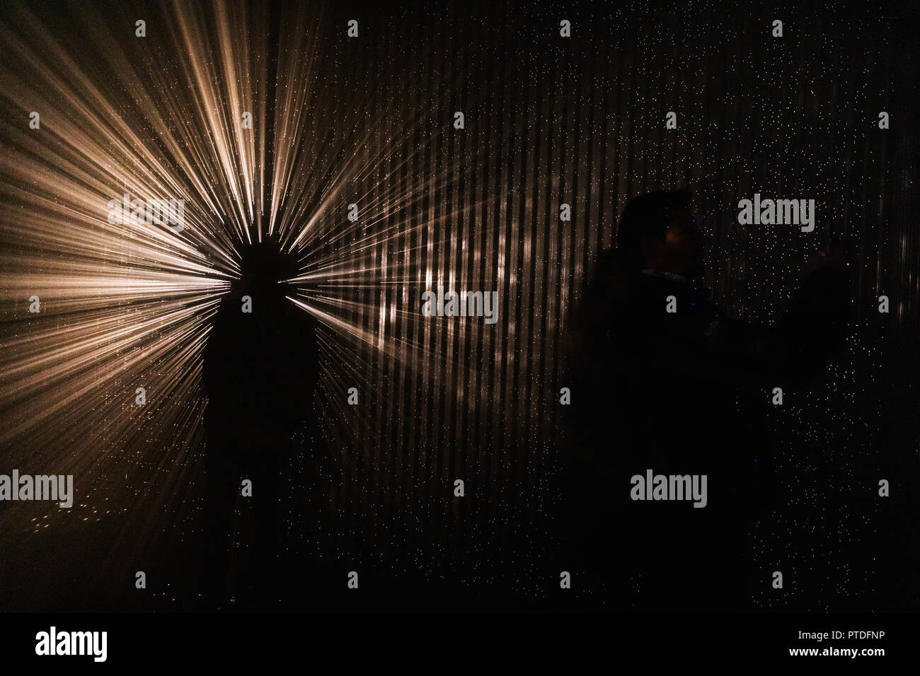 Light abstract projection. Colorful light rays. The silhouette of ...